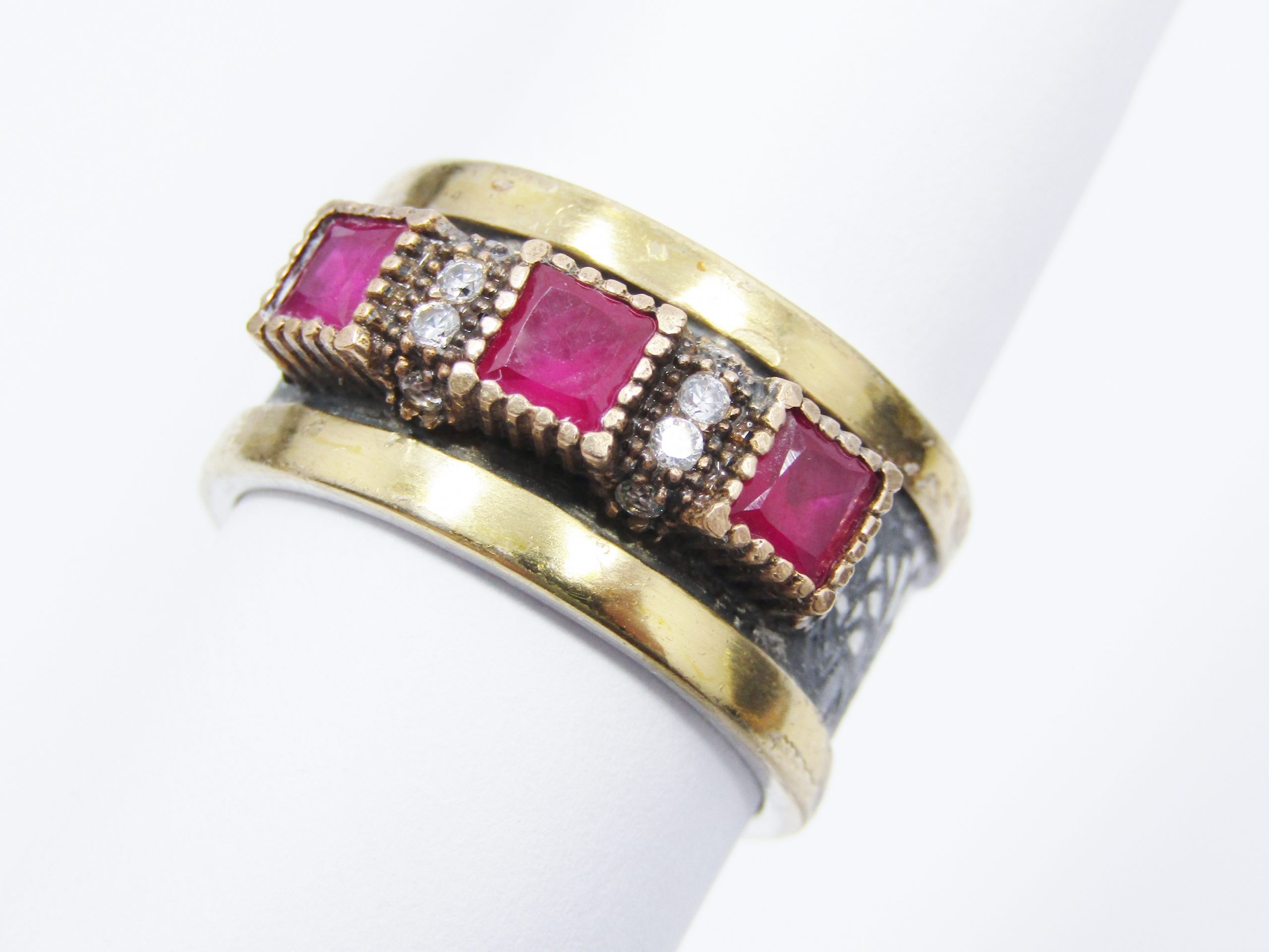 A Beautiful Weighty Three Stone Ring in a Copper over Sterling Silver.