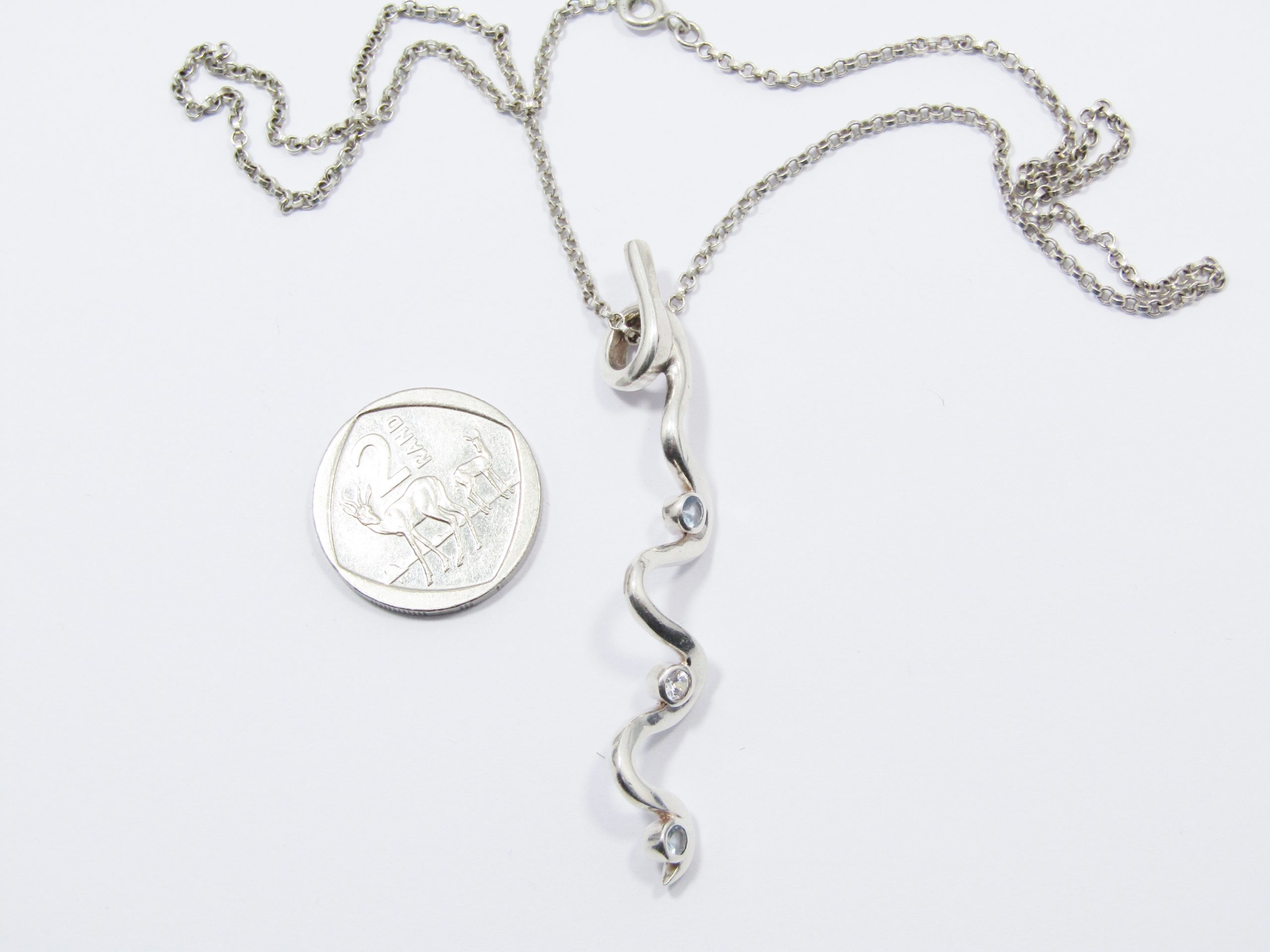 Beautiful Swirl Design Zirconia Pendant on Chain in Sterling Silver