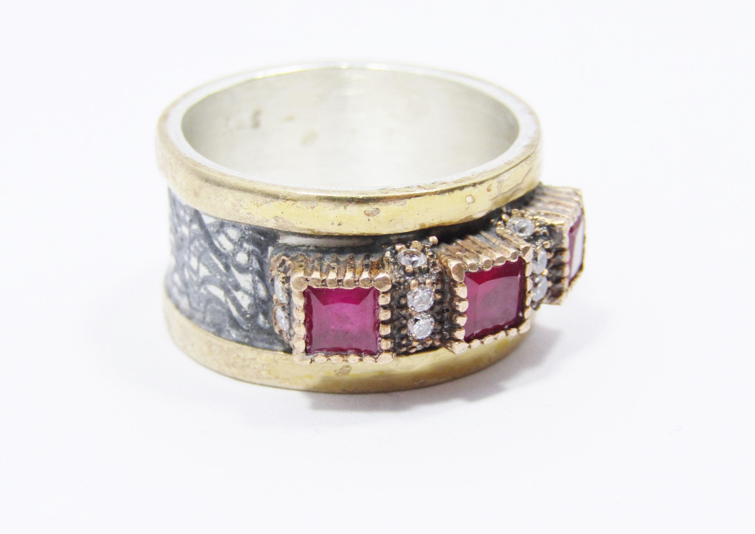 A Beautiful Weighty Three Stone Ring in a Copper over Sterling Silver.