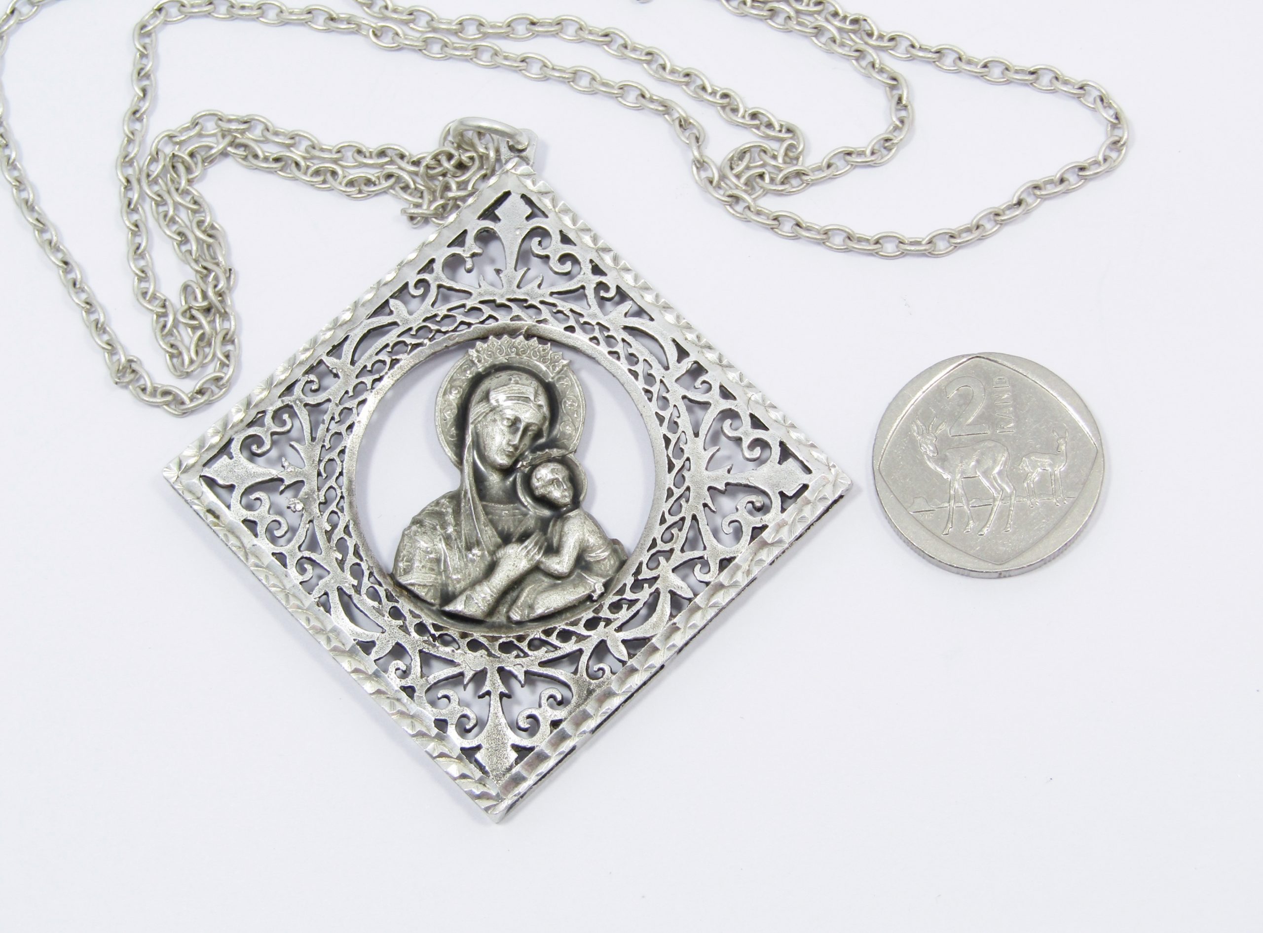 A Gorgeous Huge Madonna And Child Pendant With a Gorgeous Filigree Frame On Chain in Sterling Silver