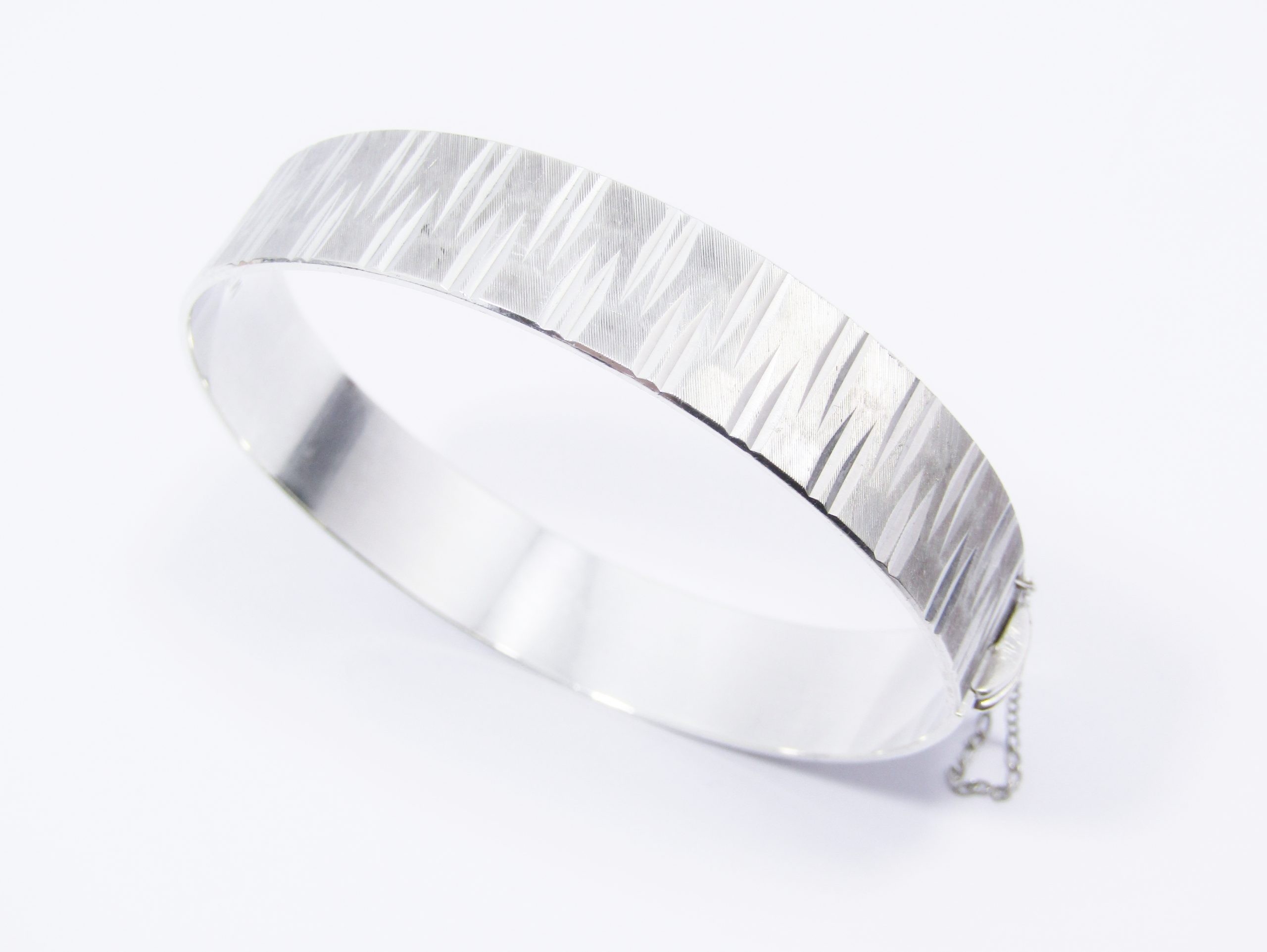 A Gorgeous Textured Hinged Bangle in Sterling Silver-