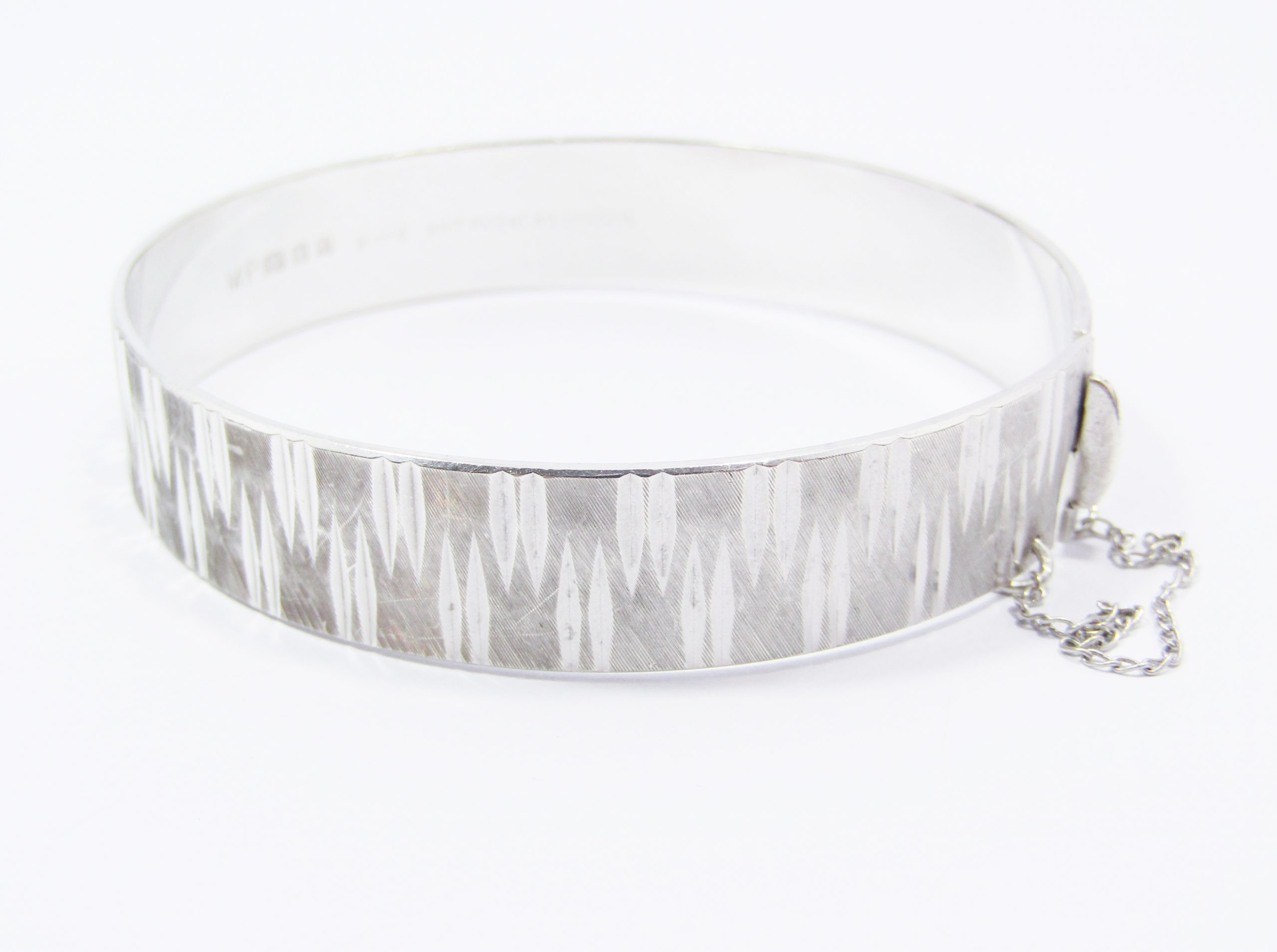 A Gorgeous Textured Hinged Bangle in Sterling Silver-