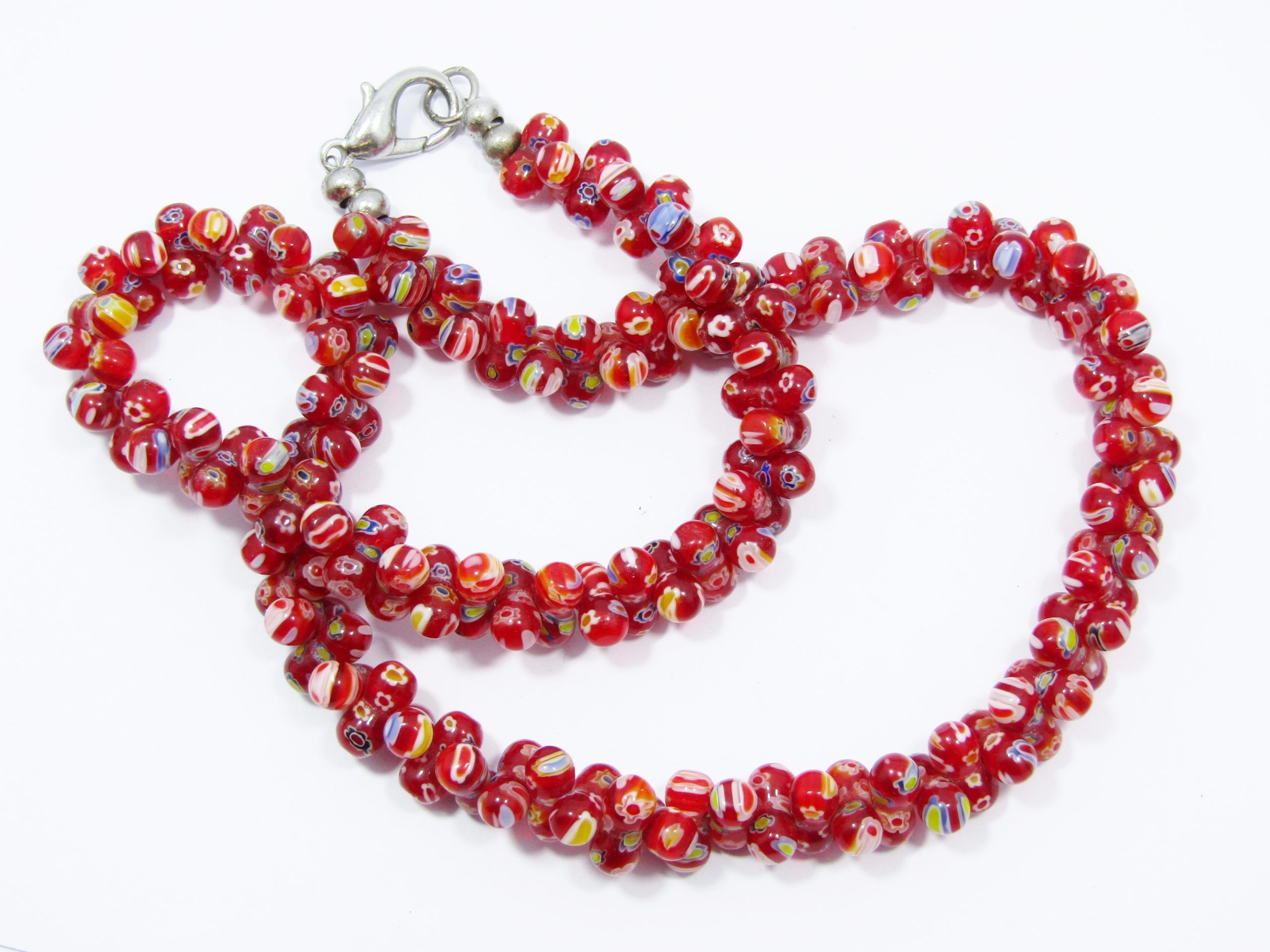 A Gorgeous Millefiori Woven Multi Strand  Necklace With a Silver Tone Clasp