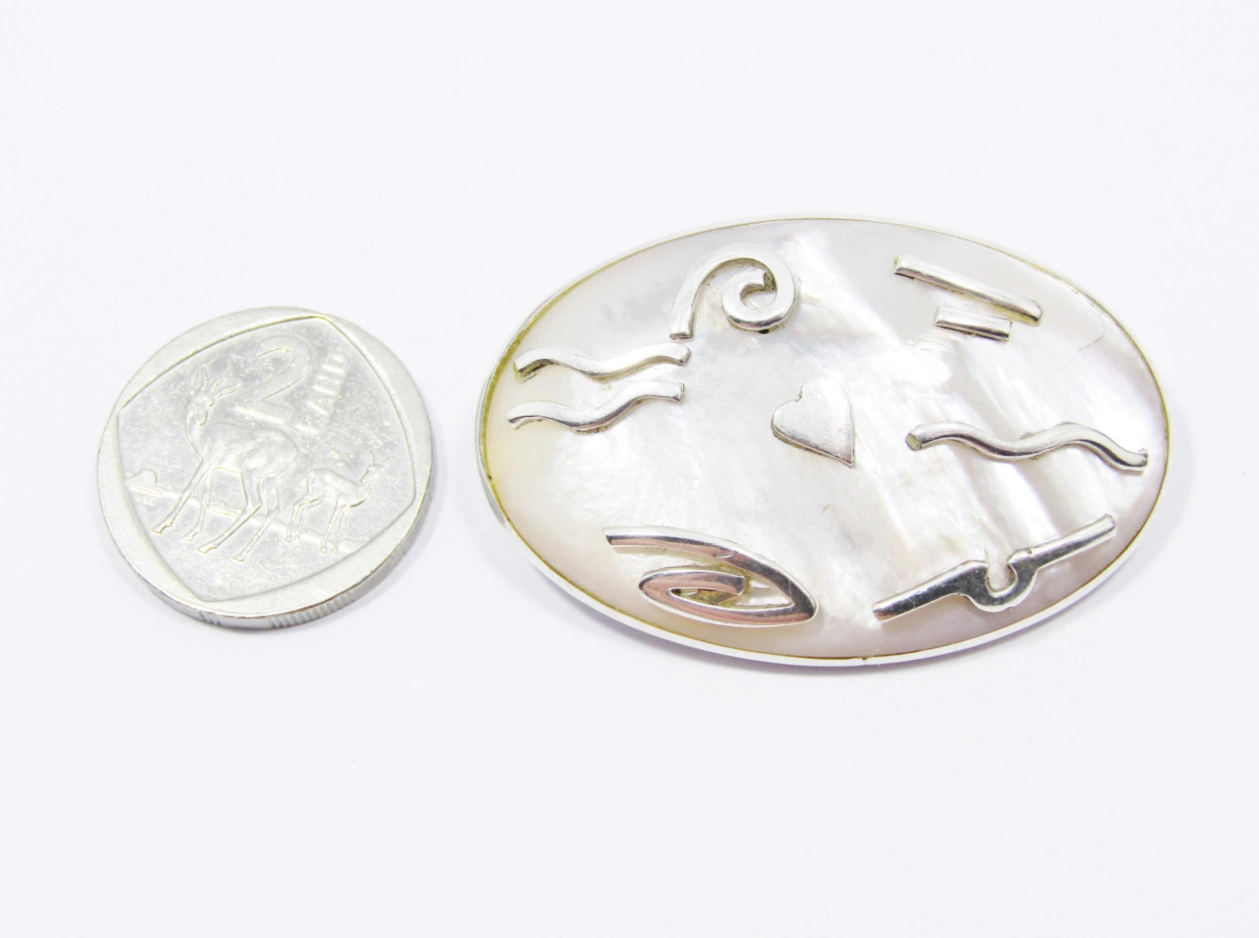 A Stunning Large Switzerland Designer Mother of Pearl Brooch in Sterling Silver