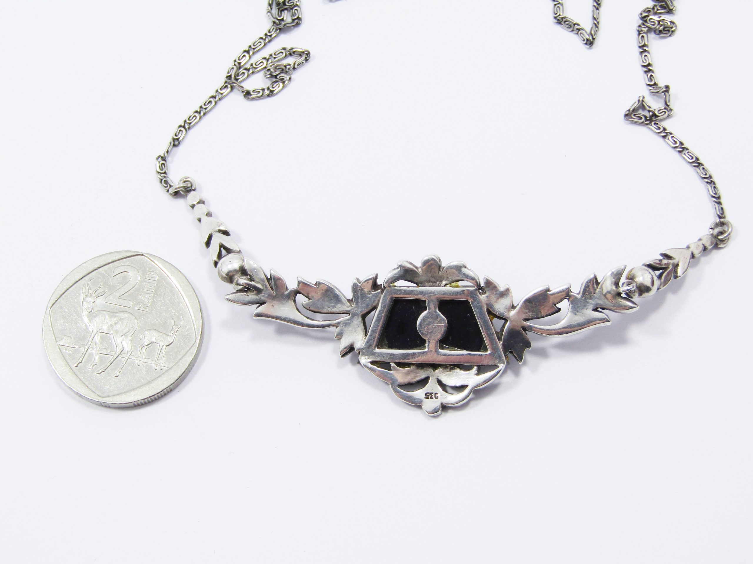 A Gorgeous Vintage Design Onyx Set with a Cultured Pearl Dotted with Marcasite's in 935 Silver