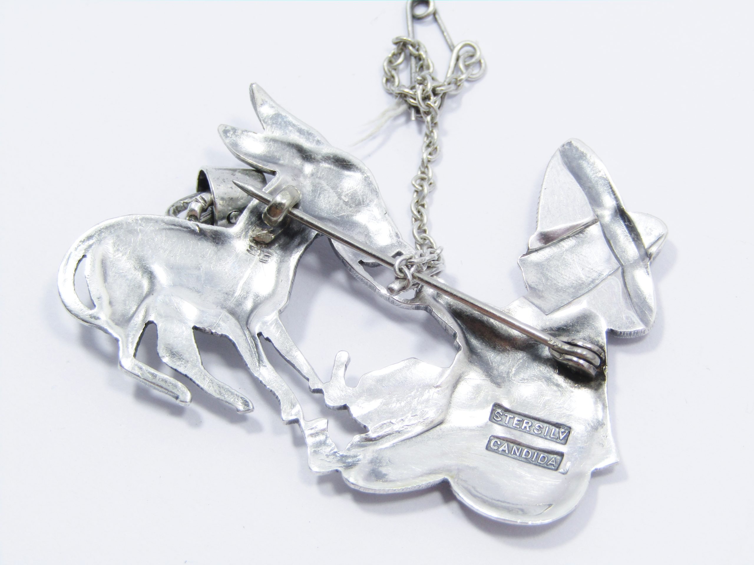 A Gorgeous and Oh So Different CANDIDA Mexican and the Donkey Brooch in Sterling Silver.