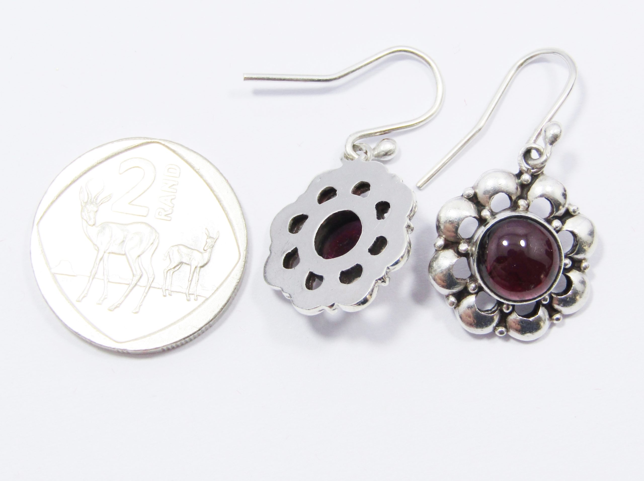 A gorgeous Pair of Garnet Earrings in Sterling Silver