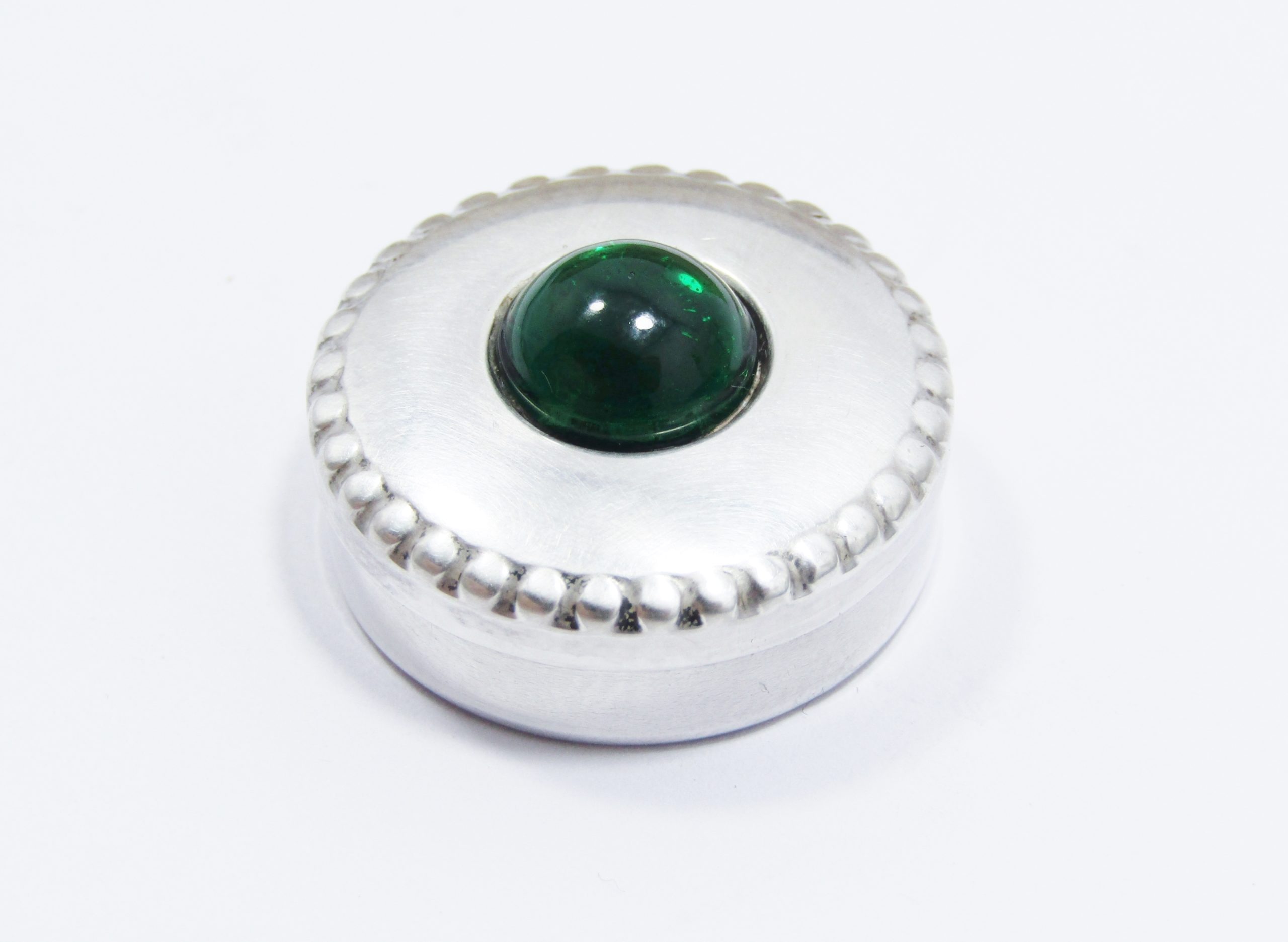 A Small Pill Box with a Green Center Stone With Spanish Hallmarks in Sterling Silver