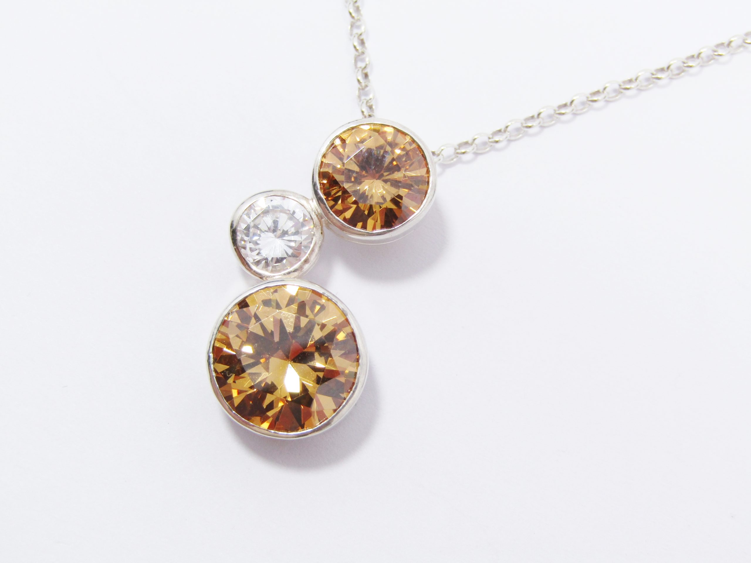Beautiful Orange And Clear Zirconia Pendant On Chain in Sterling Silver
