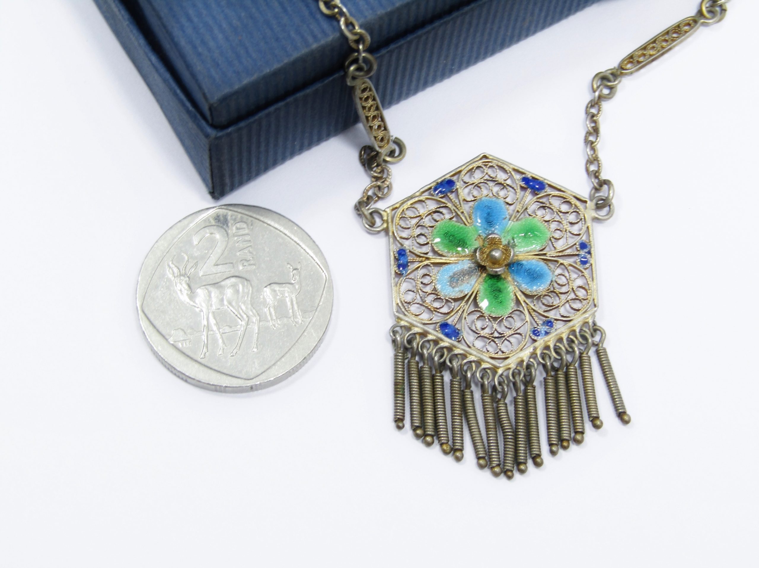 A stunning Gold Tone Filigree Pendant With a Lovely inlay in Portugal Silver