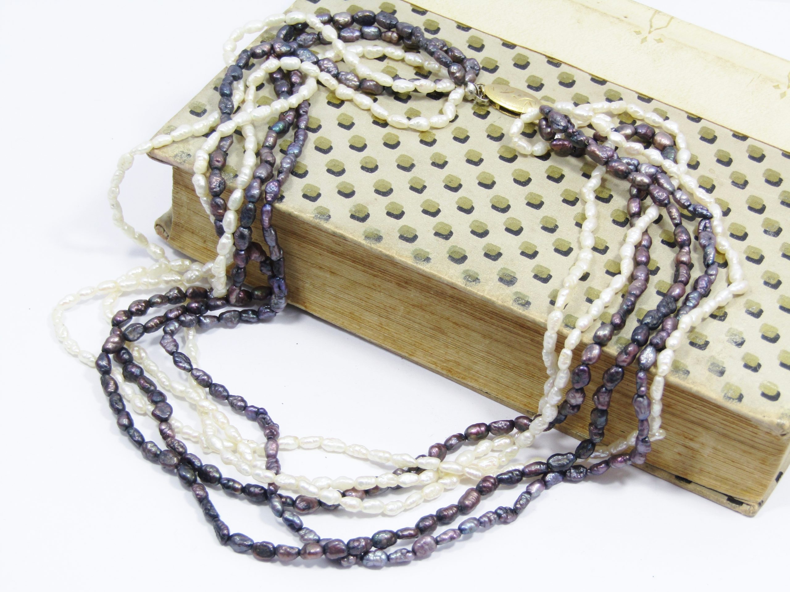 A Gorgeous Multi String Rice Pearl Necklace With a Vintage Rolled Gold Clasp