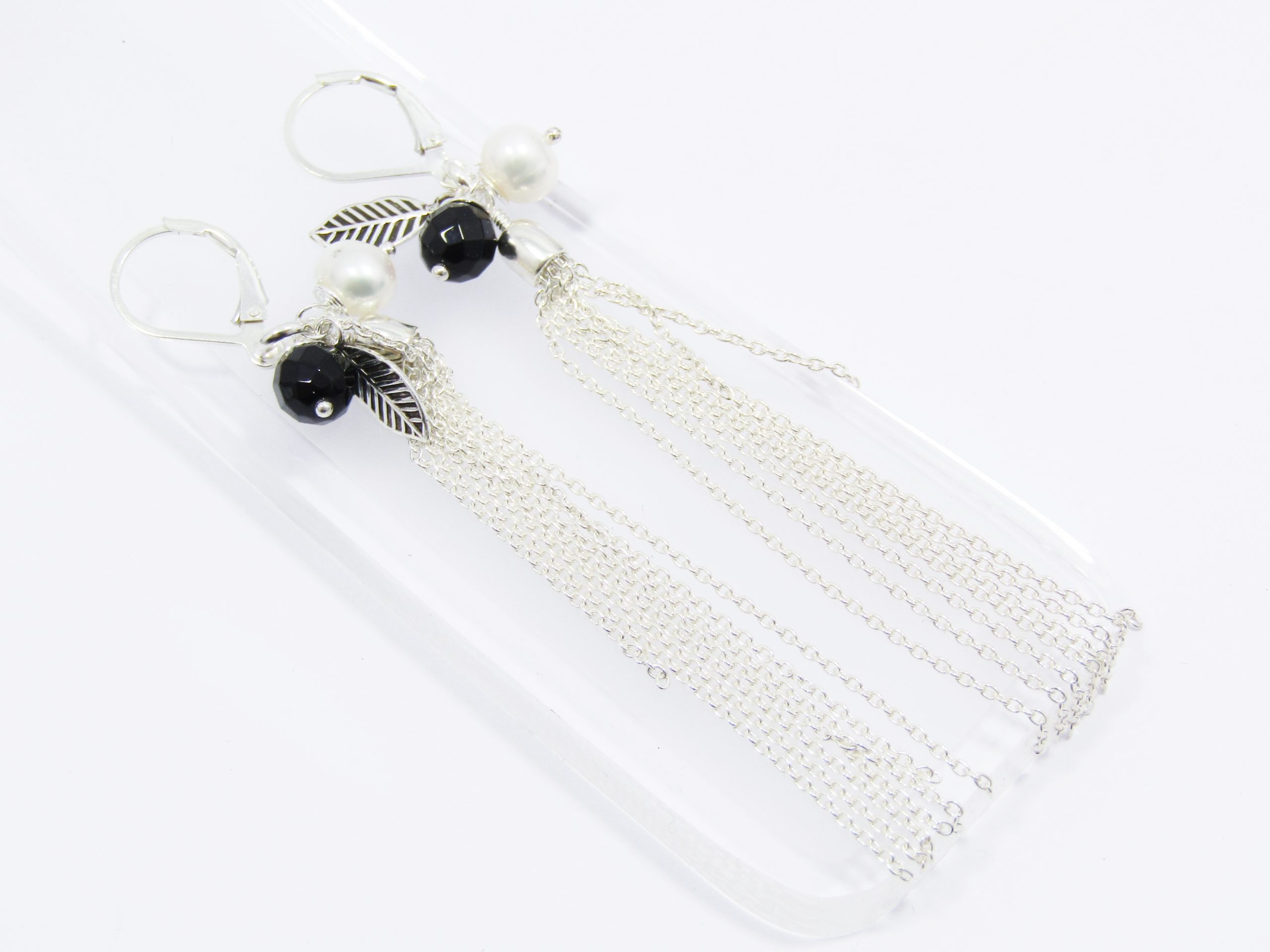 A Gorgeous Pair of Fresh Water Pearl and Obsidian Bead Tassel Earrings in Sterling Silver.