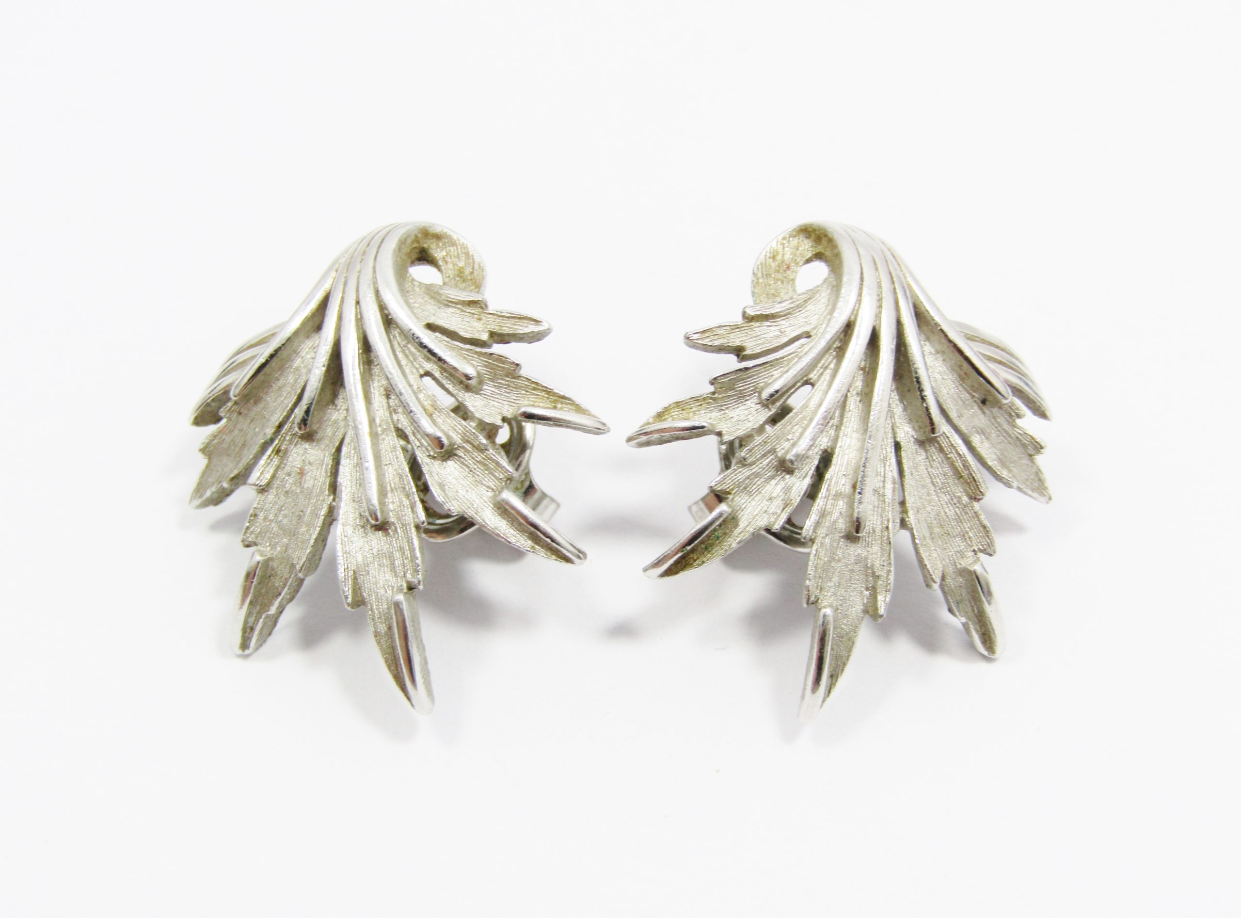 A Beautiful Pair of Trifari Design Clip on Earrings in a Silver Tone