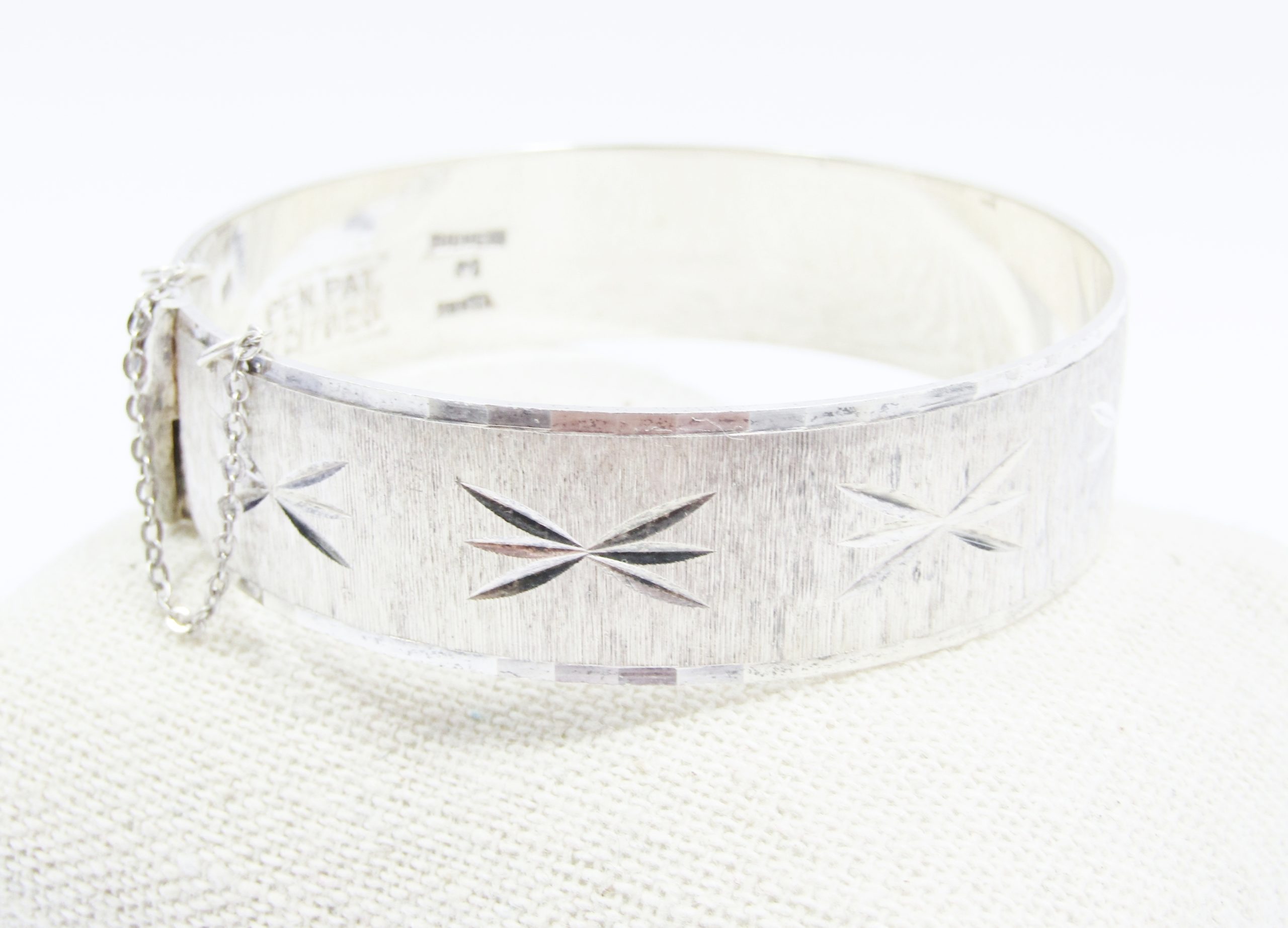 A Beautiful Textured Solid Hinged  Bangle in Sterling Silver