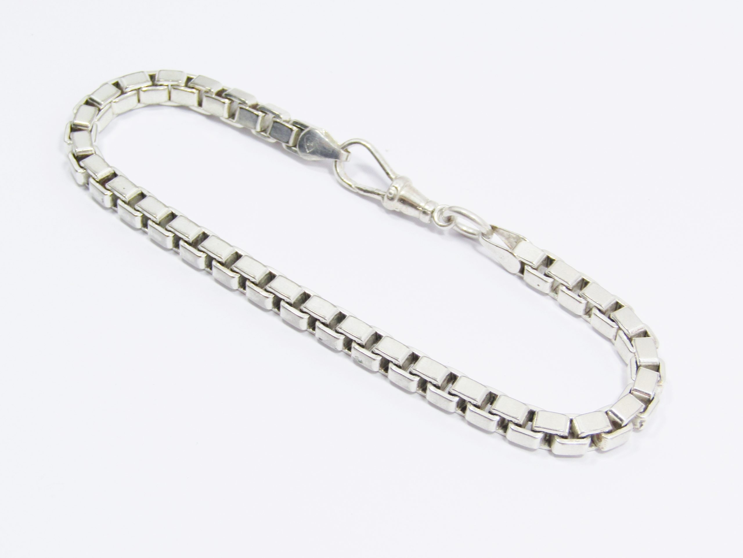 A Lovely Square Link Bracelet With a Dog Clip Clasp in Sterling Silver