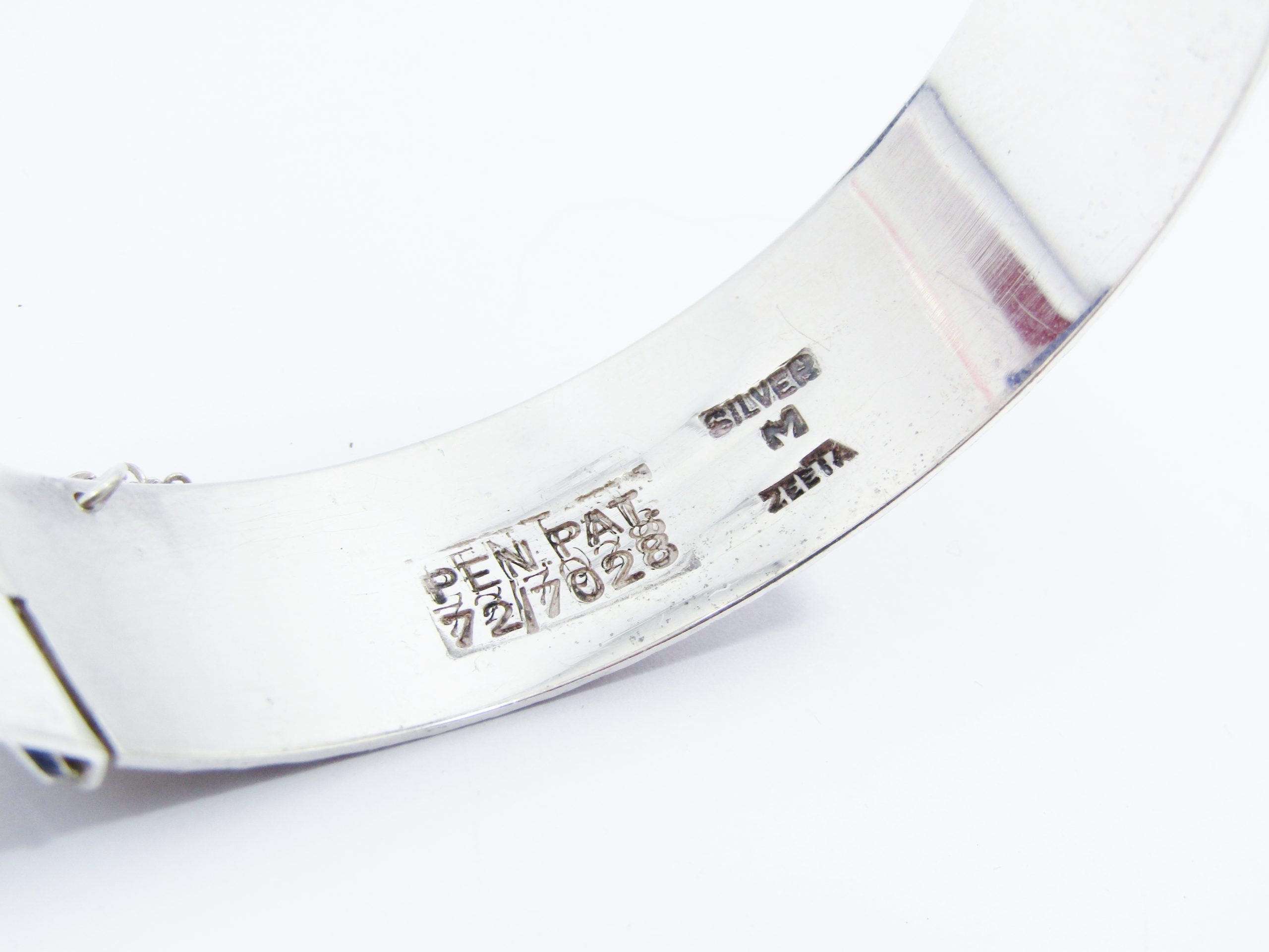 A Beautiful Textured Solid Hinged  Bangle in Sterling Silver