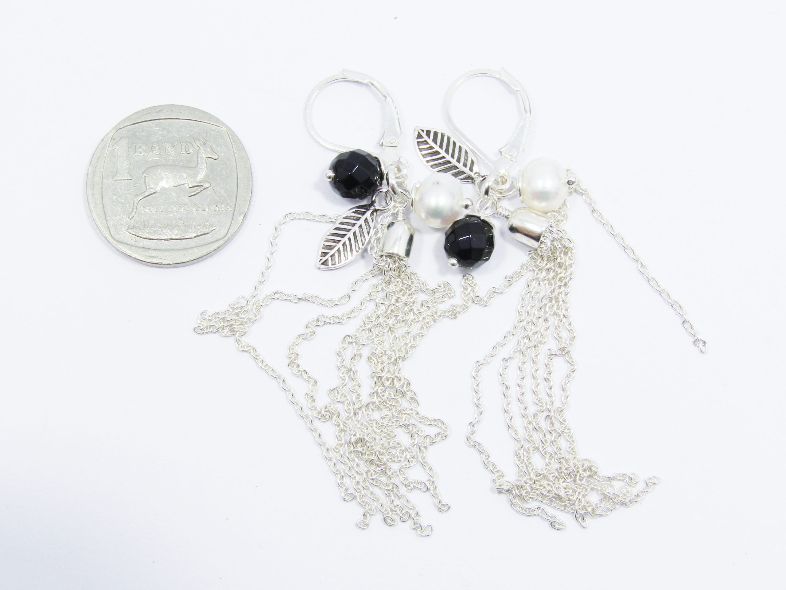 A Gorgeous Pair of Fresh Water Pearl and Obsidian Bead Tassel Earrings in Sterling Silver.