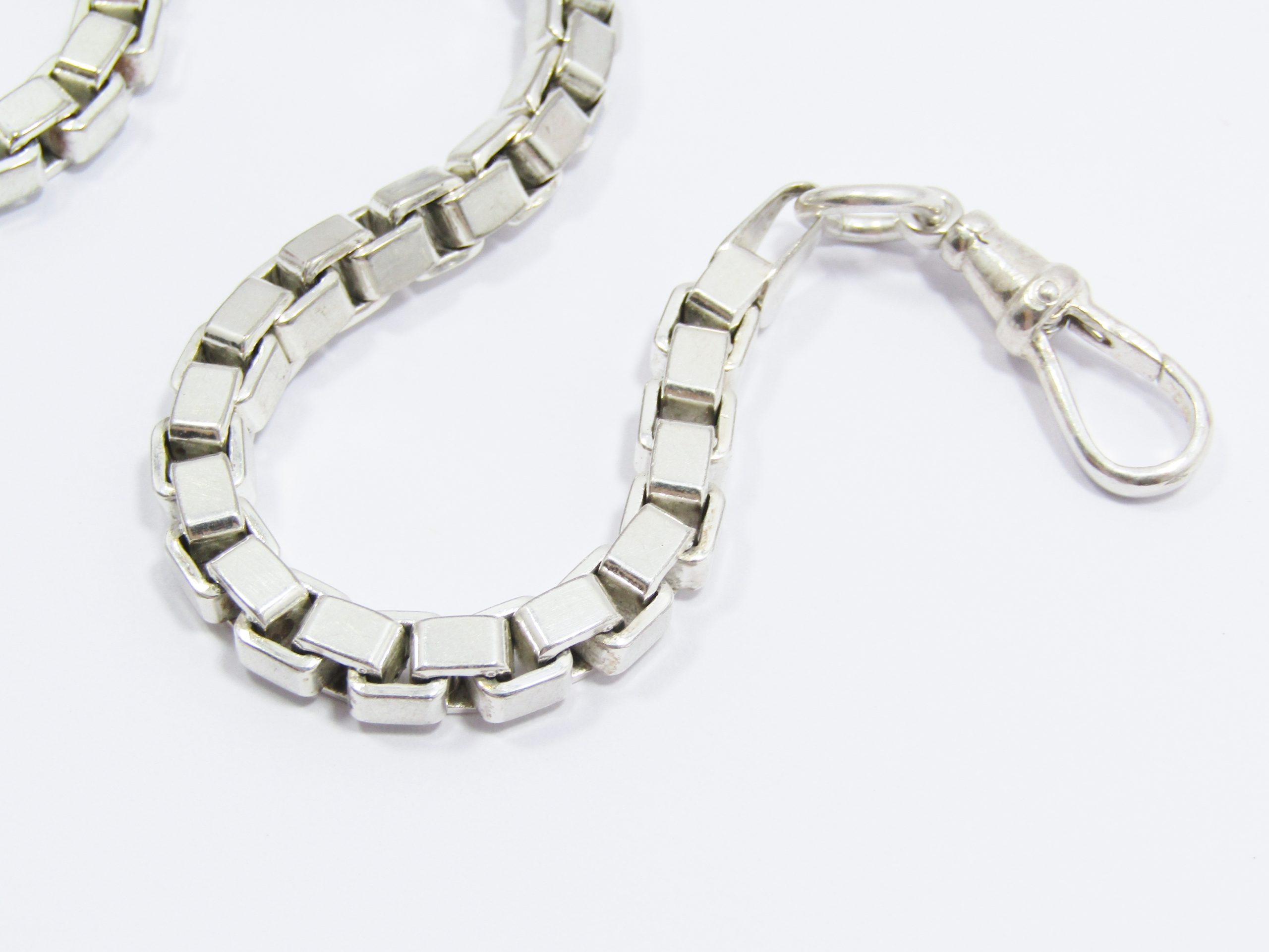 A Lovely Square Link Bracelet With a Dog Clip Clasp in Sterling Silver