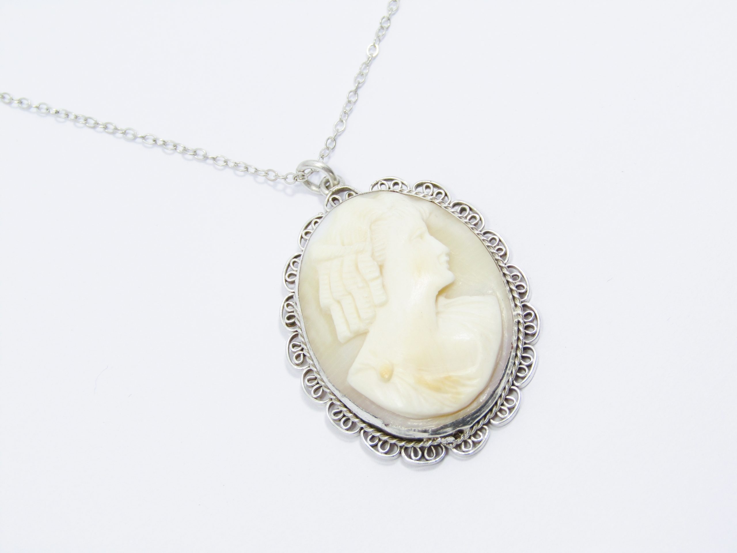 A Gorgeous Large Vintage Carved Pendant On chain in Sterling Silver