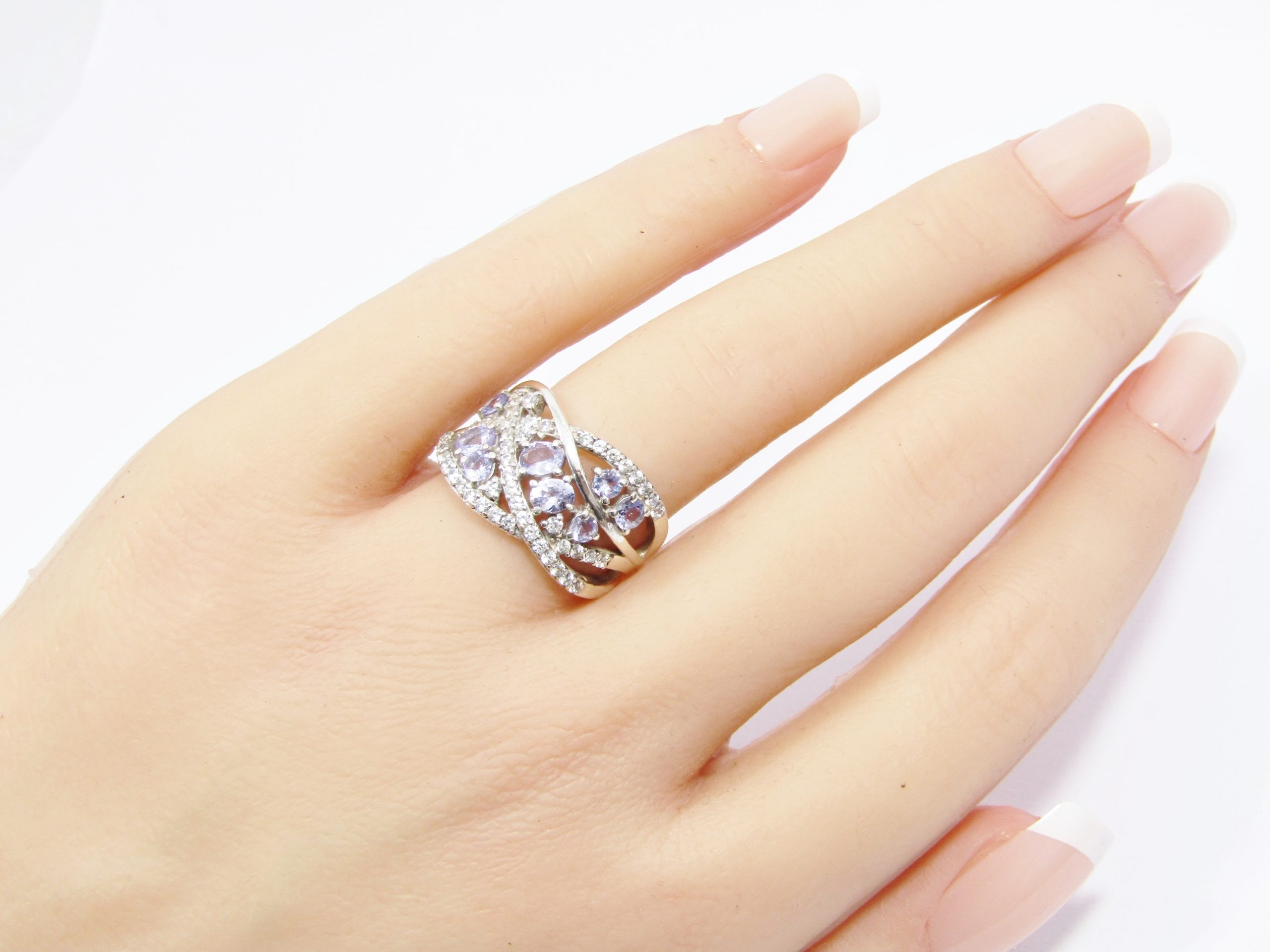 A Stunning Broad Filigree Tanzanite and Clear Zirconia Ring in Sterling Silver.