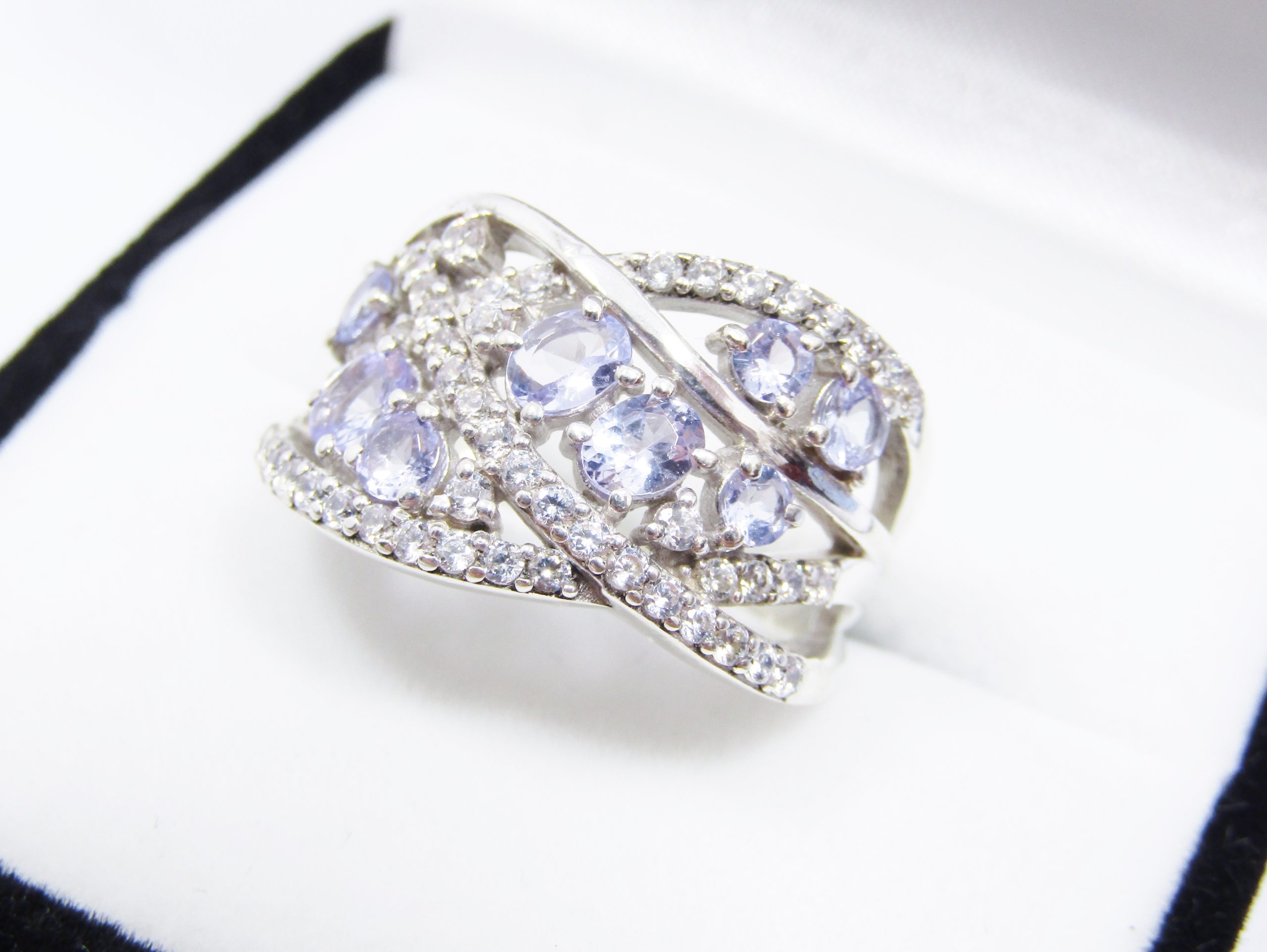 A Stunning Broad Filigree Tanzanite and Clear Zirconia Ring in Sterling Silver.