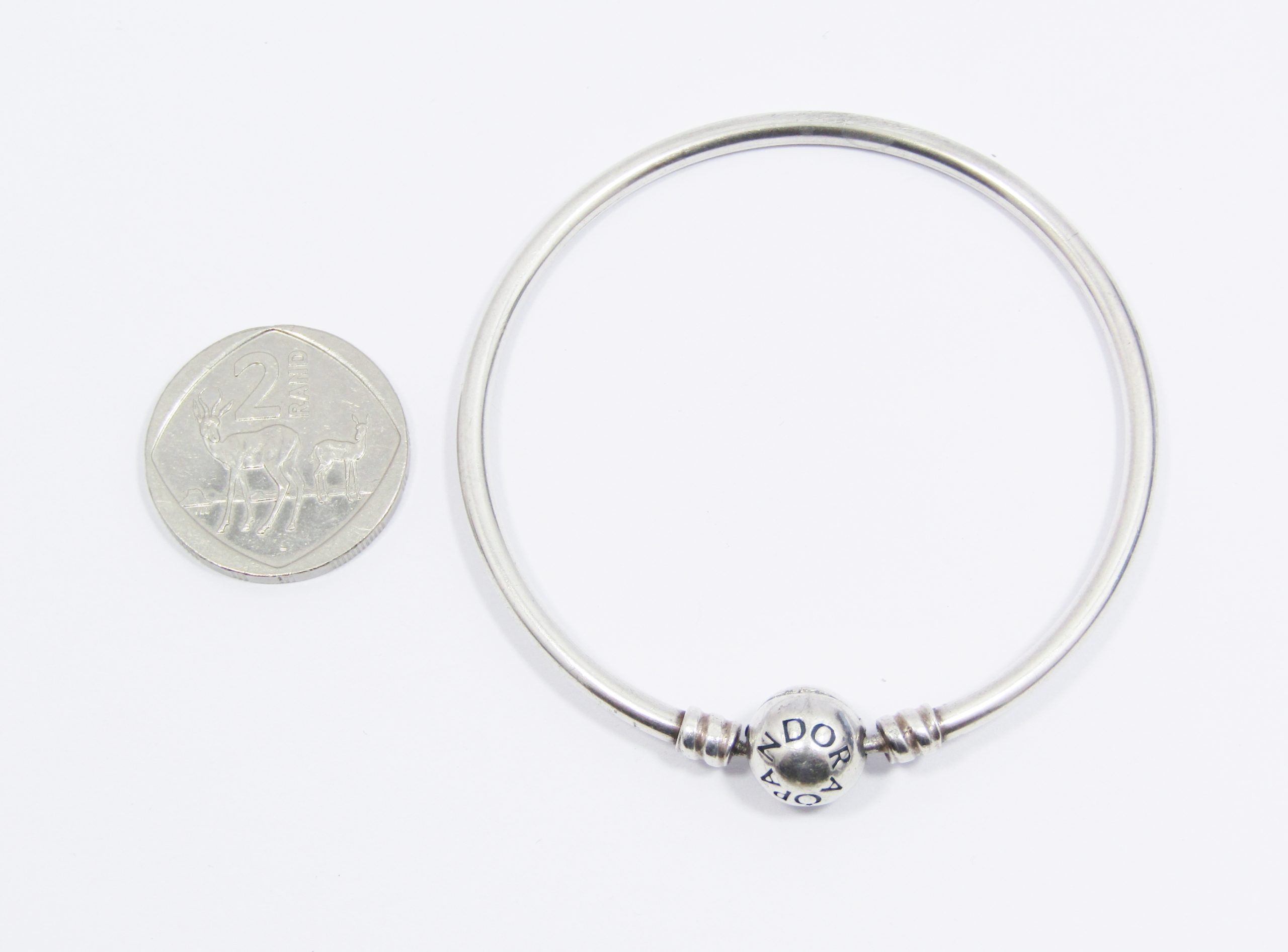 A Lovely Pandora Solid Bangle in Sterling Silver