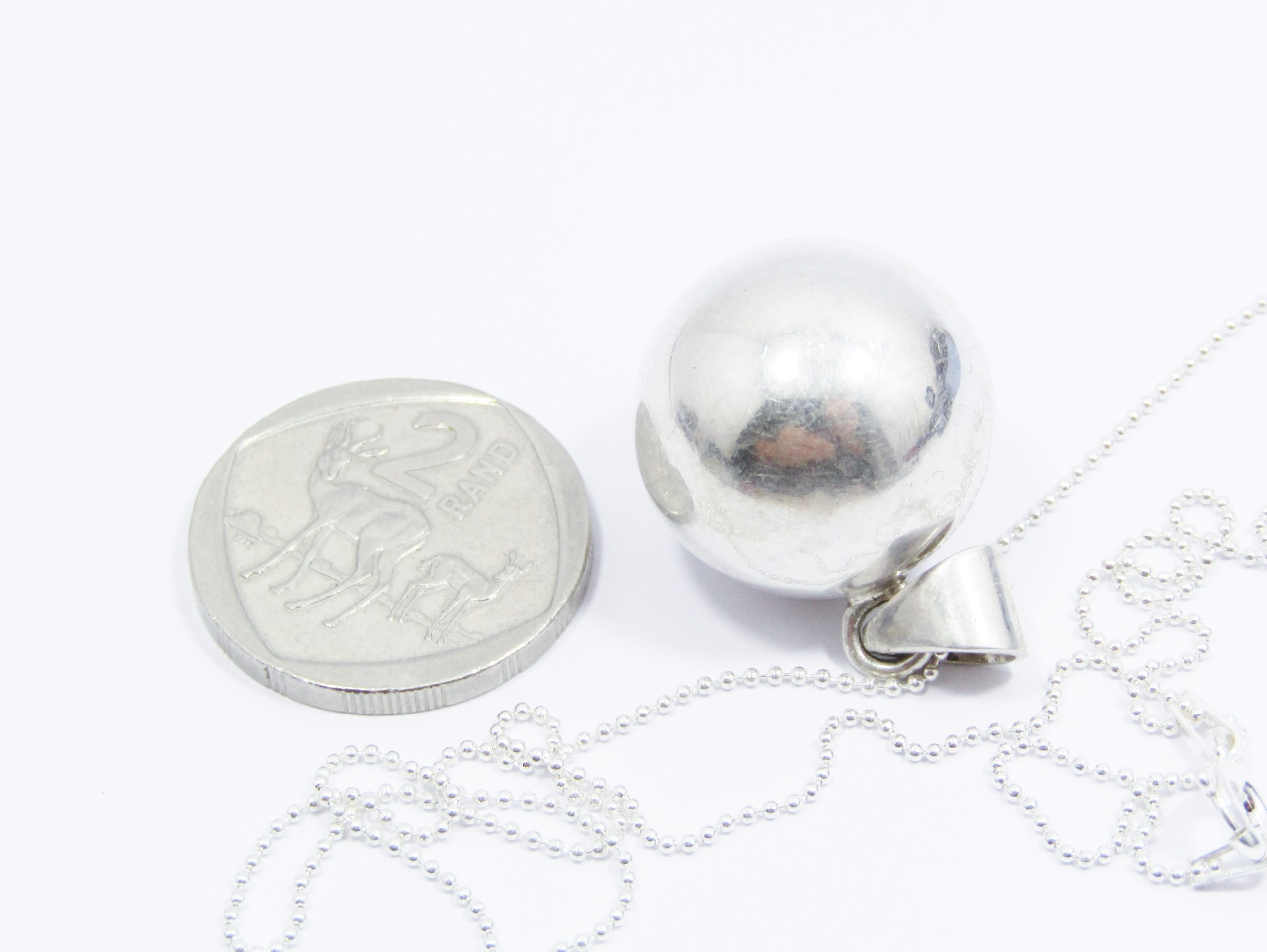 A Stunning Ball Pendant on Chain in Sterling Silve