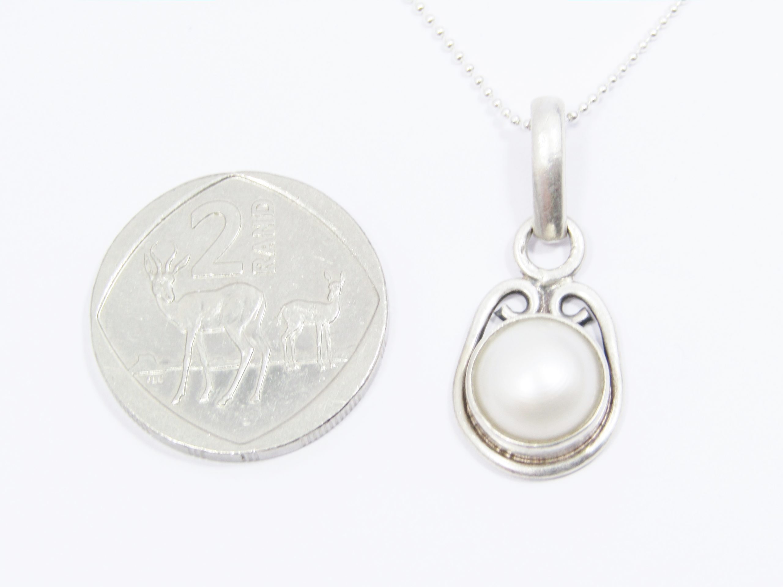 A Lovely Fresh Water Pearl Pendant on Chain in Sterling Silver