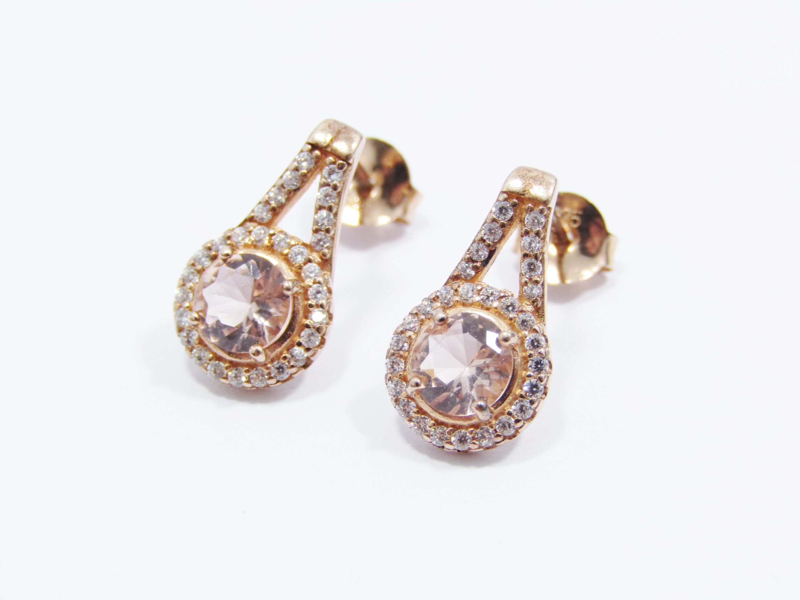 A Stunning Pair of Rose Gold Plated over Sterling Silver Zirconia Earrings