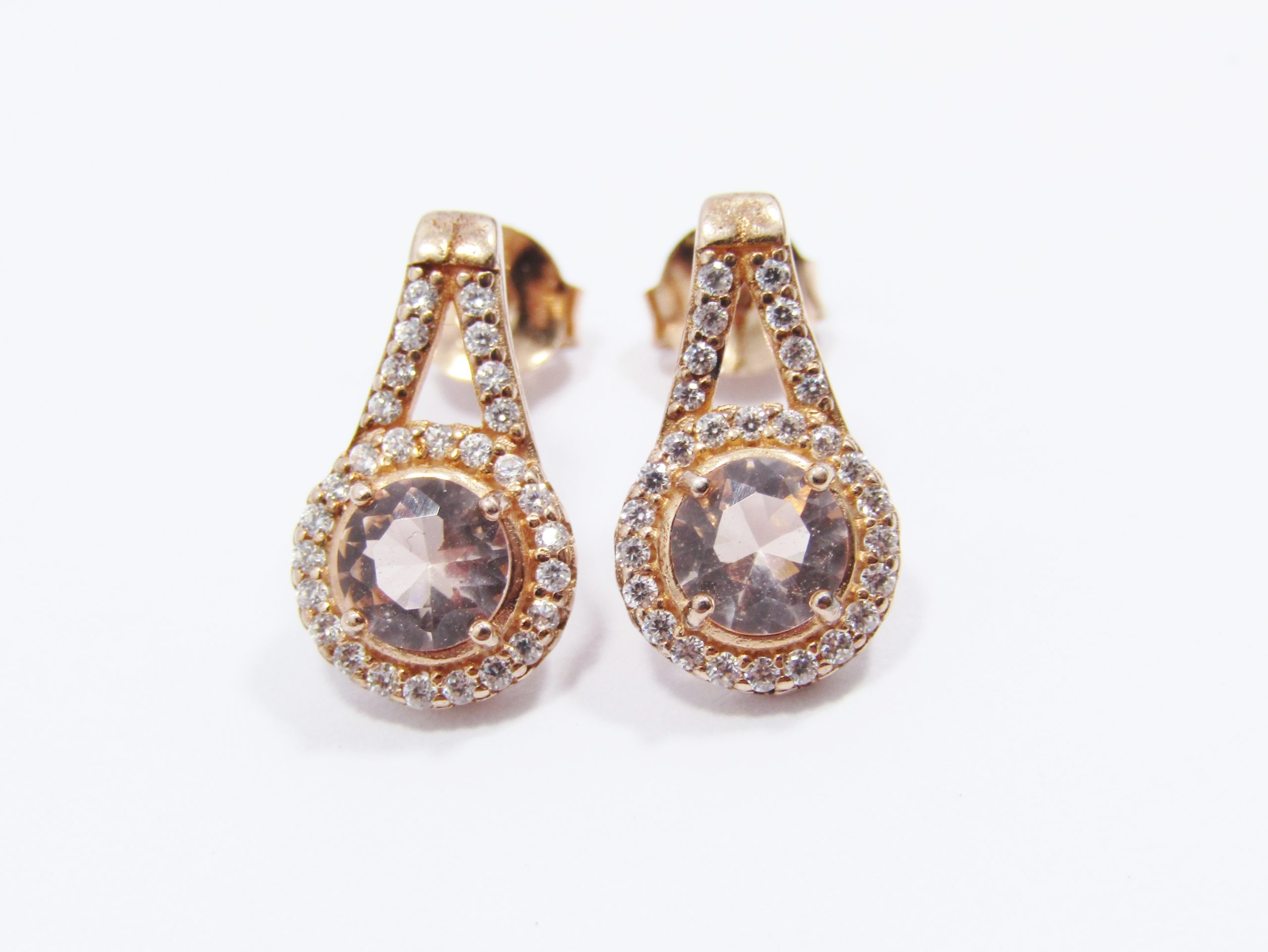 A Stunning Pair of Rose Gold Plated over Sterling Silver Zirconia Earrings