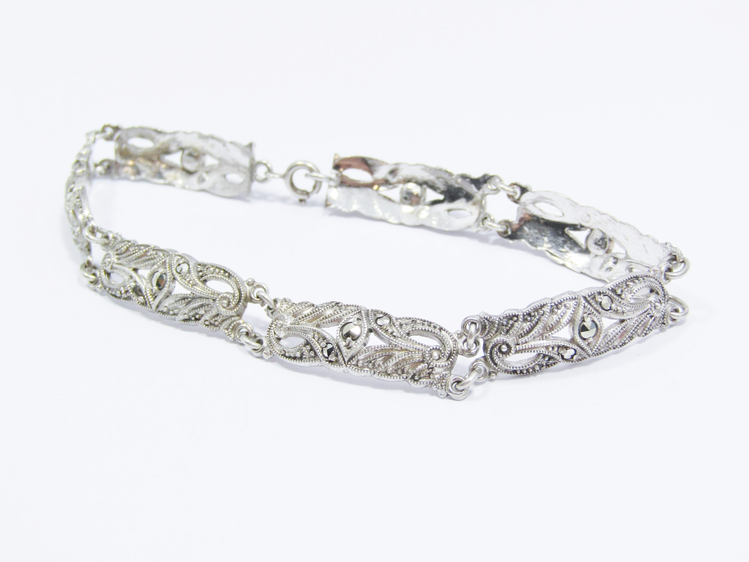 A Very Pretty Vintage Design Paneled Marcasite Bracelet in Sterling Silver.