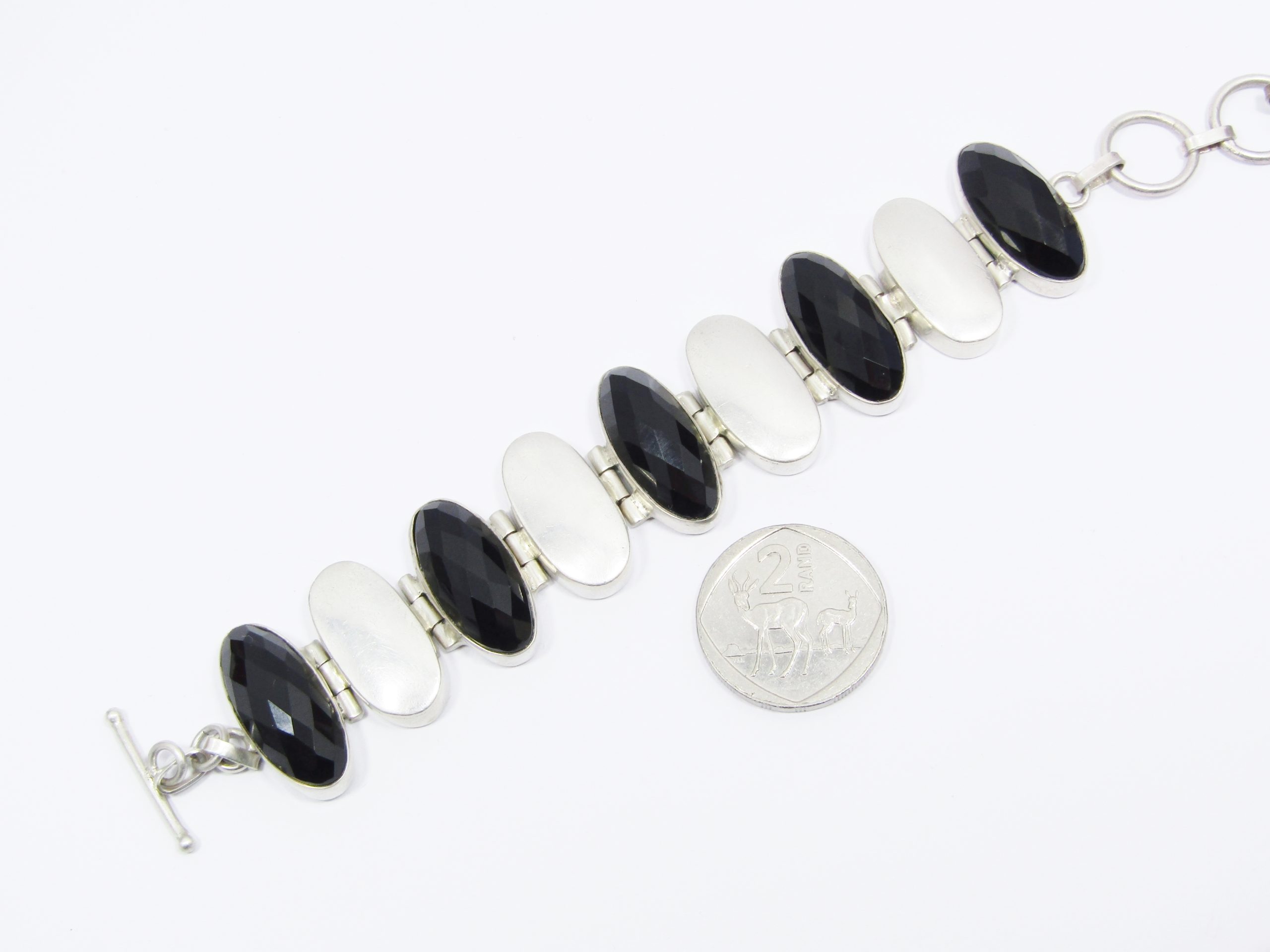 A Gorgeous Black Stone Paneled Bracelet With a Fob Clasp in Sterling Silver