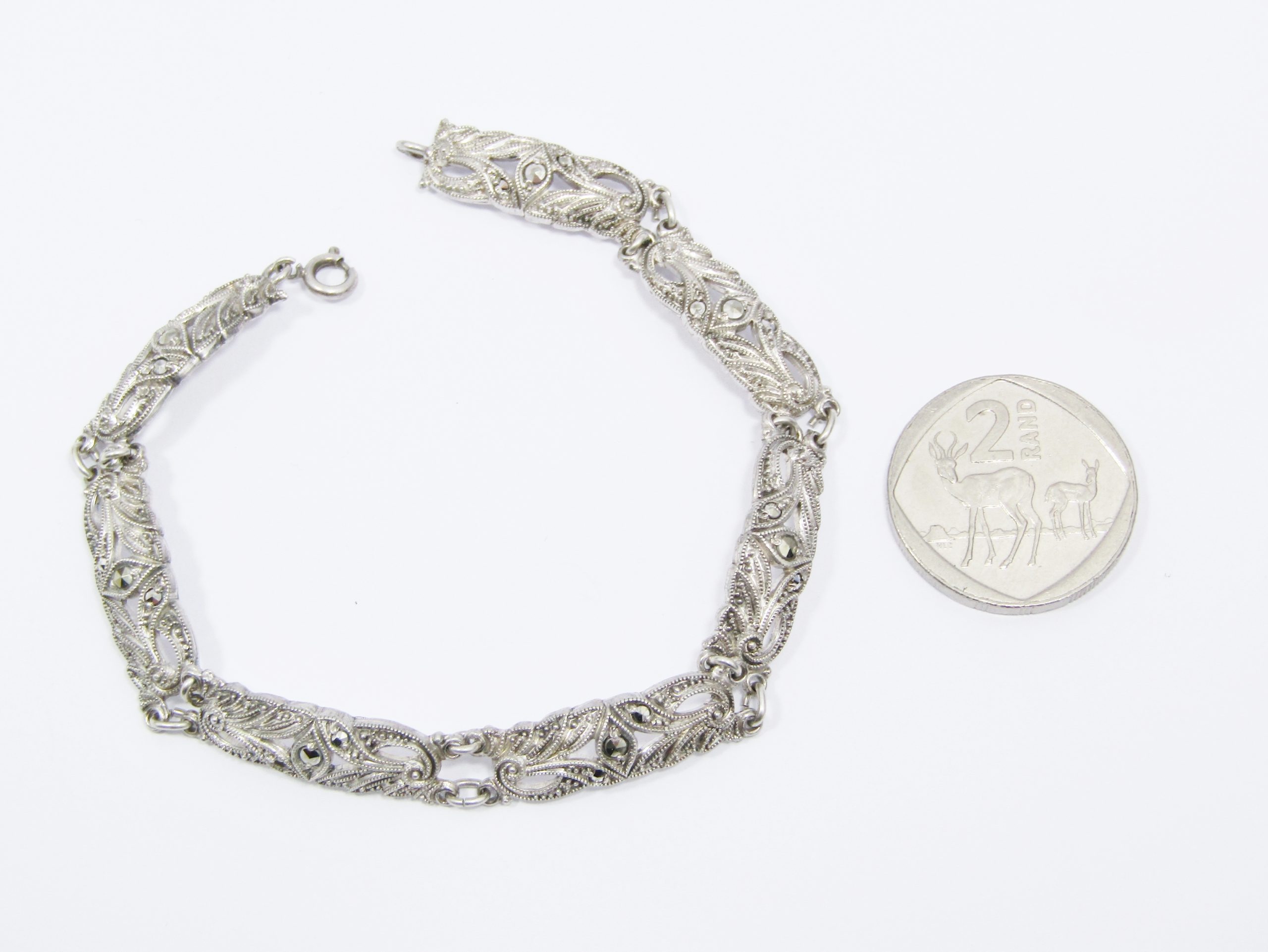 A Very Pretty Vintage Design Paneled Marcasite Bracelet in Sterling Silver.