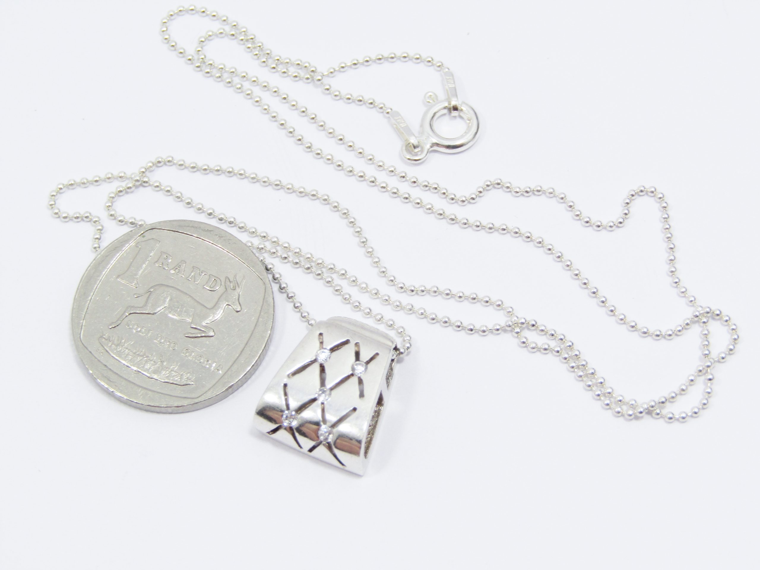 A Very Pretty Zirconia Slider Pendant on Chain in Sterling Silver.