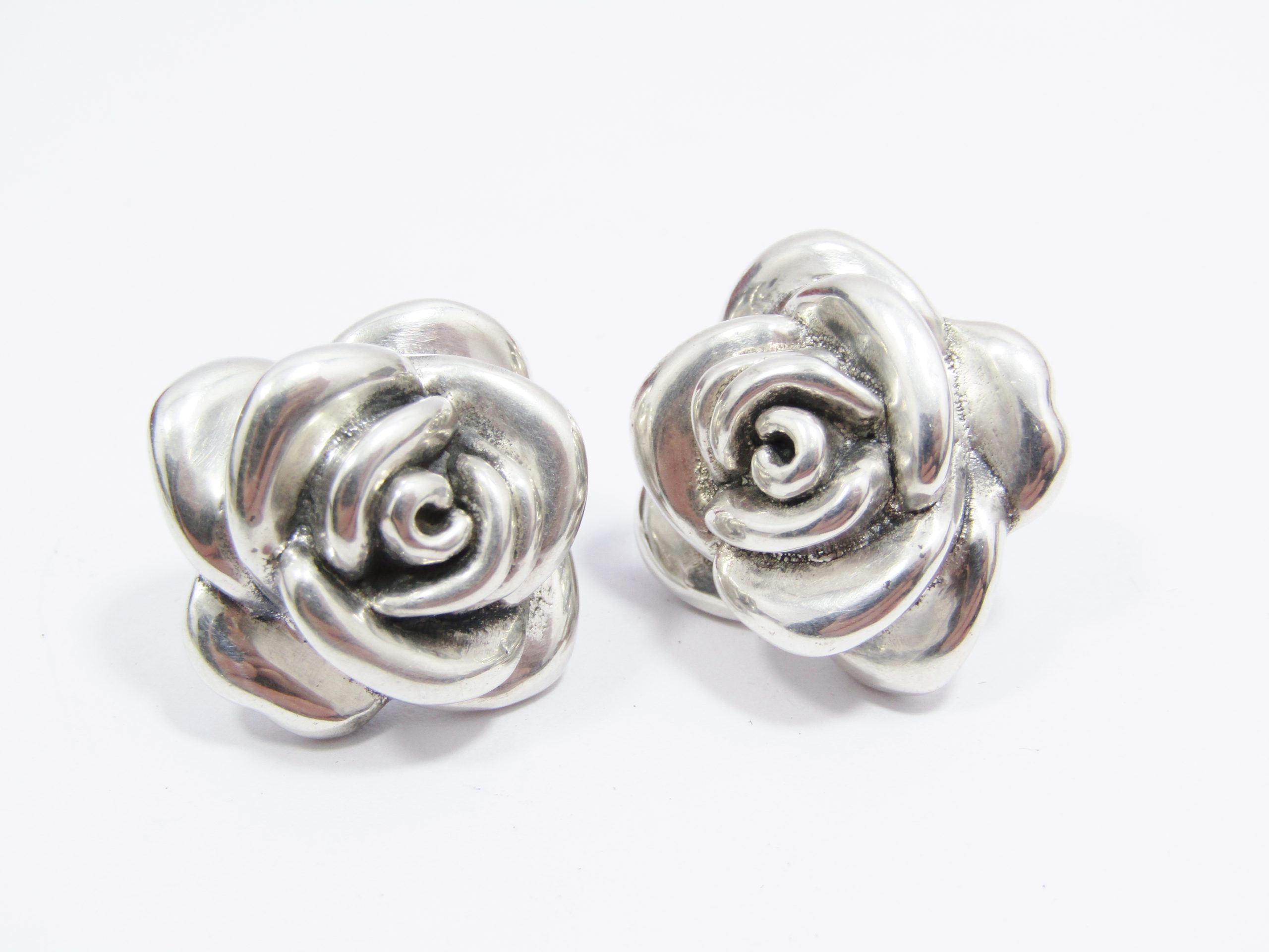 A Gorgeous Pair of Hollow Rose Design Earrings in Sterling Silver.
