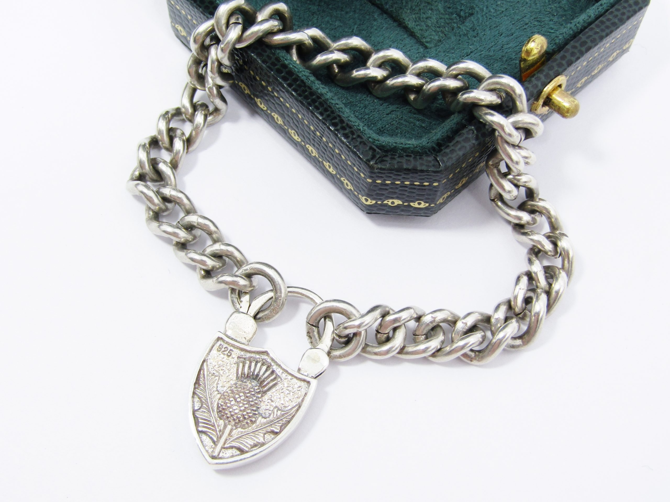 A Stunning Chunky Vintage Design Bracelet With a Large Mother of Pearl Padlock in Sterling Silver.