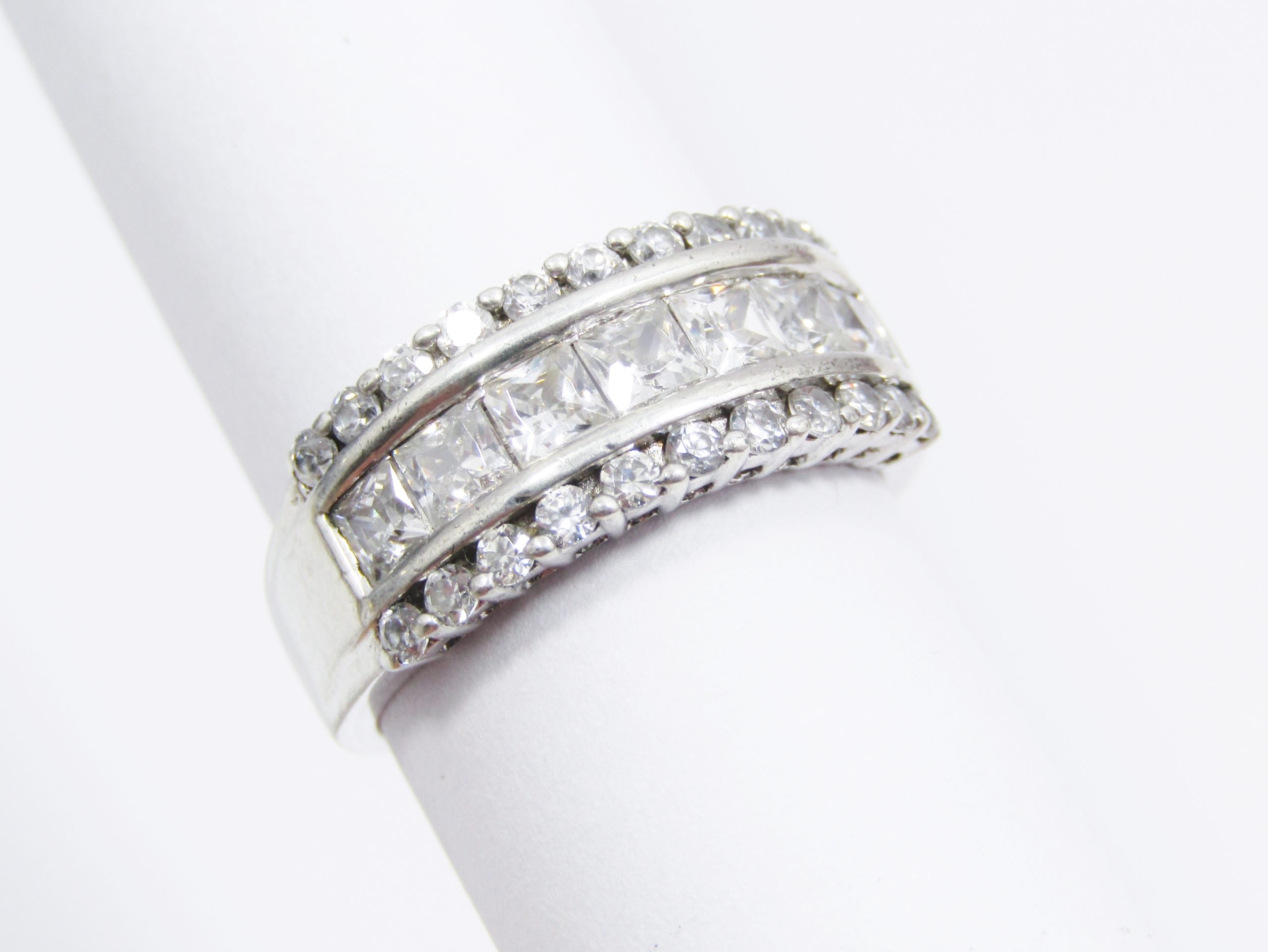 A Gorgeous Broad Band Zirconia Eternity band in Sterling Silver.