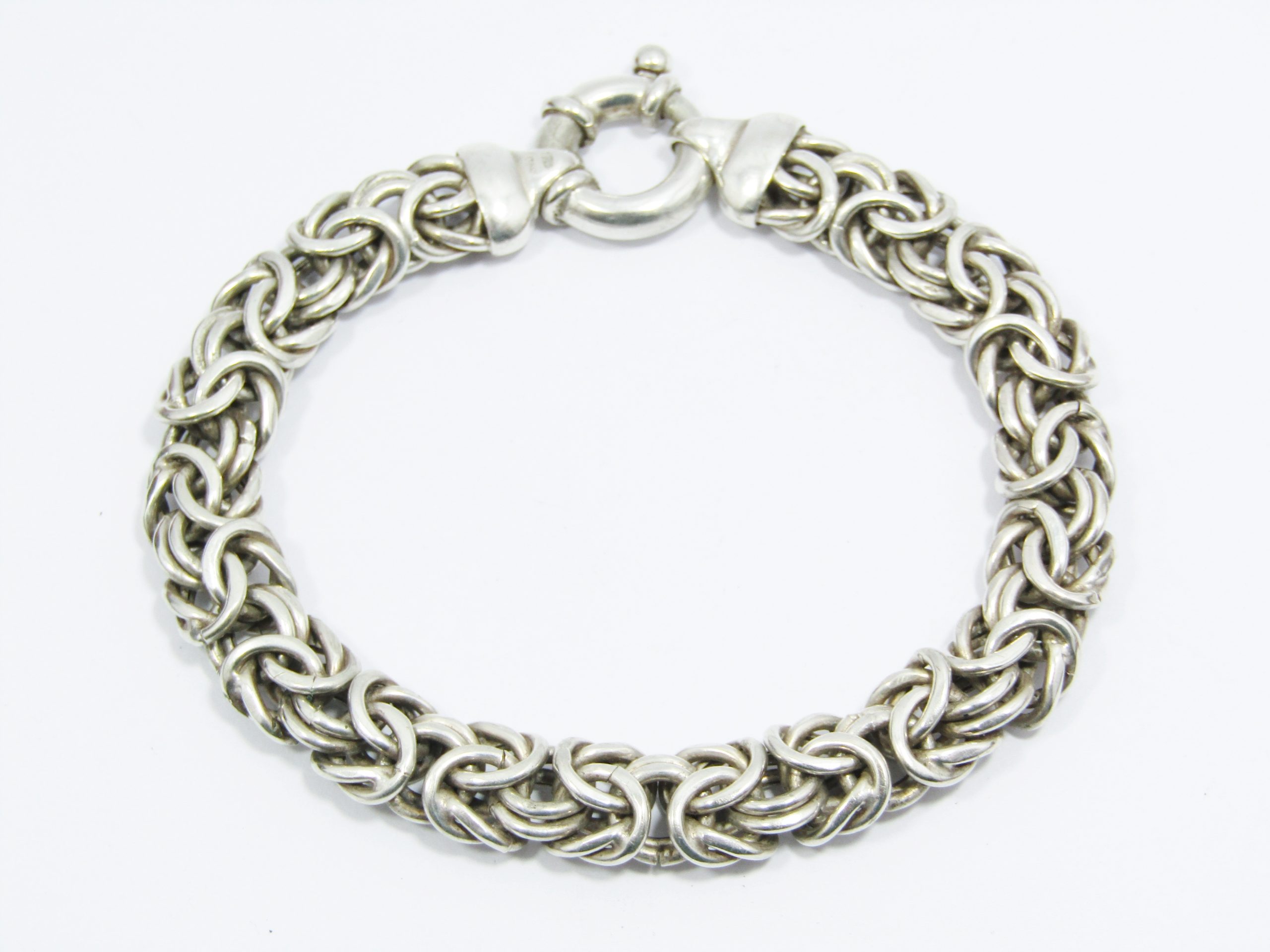 A Gorgeous Chunky Inter Linking Bracelet with a Signoretti Clasp in Sterling Silver.