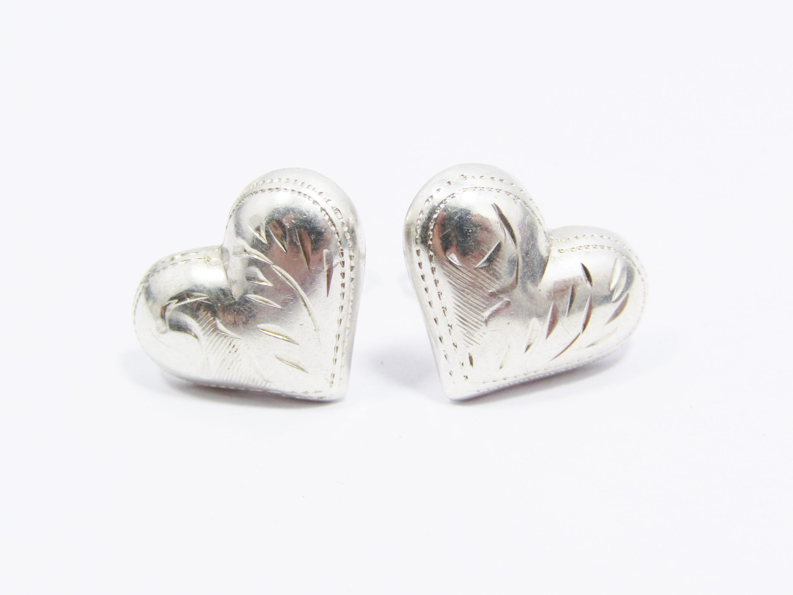 A Very Pretty Pair of Engraved Hearts Stud Earrings in Sterling Silver