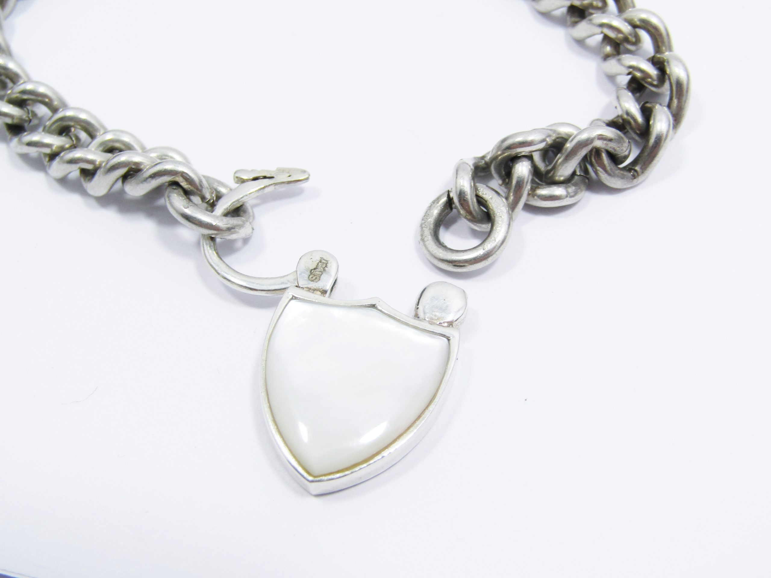 A Stunning Chunky Vintage Design Bracelet With a Large Mother of Pearl Padlock in Sterling Silver.