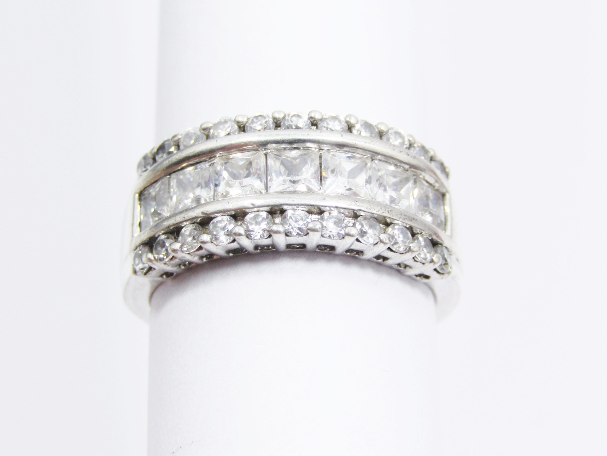 A Gorgeous Broad Band Zirconia Eternity band in Sterling Silver.