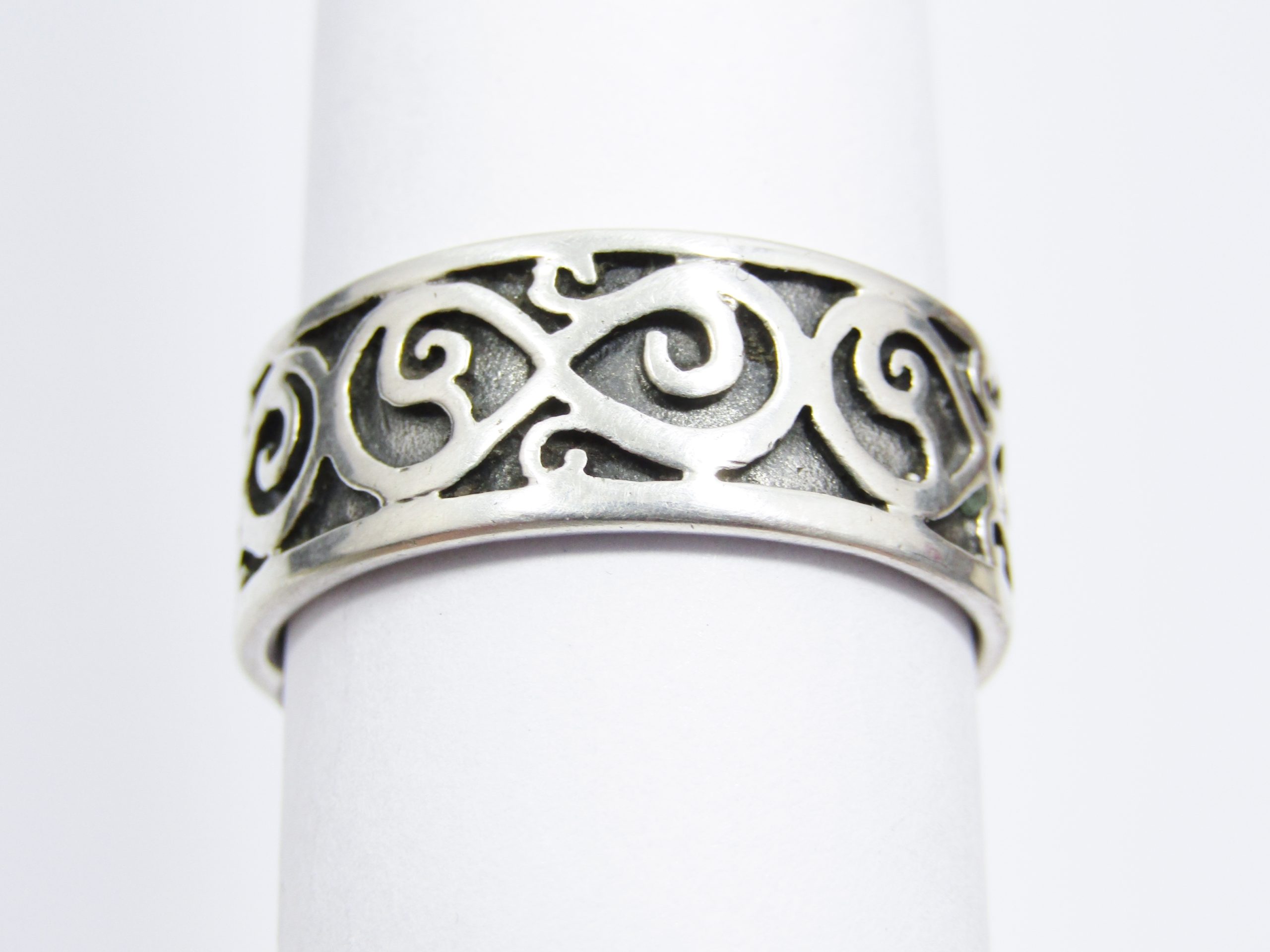A Lovely Broad Band Infinity of Life Design Ring in Sterling Silver