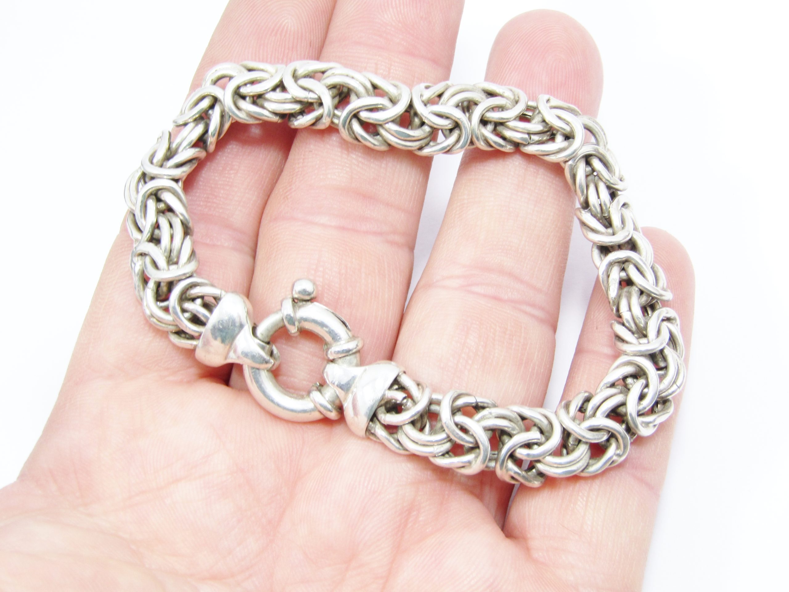 A Gorgeous Chunky Inter Linking Bracelet with a Signoretti Clasp in Sterling Silver.