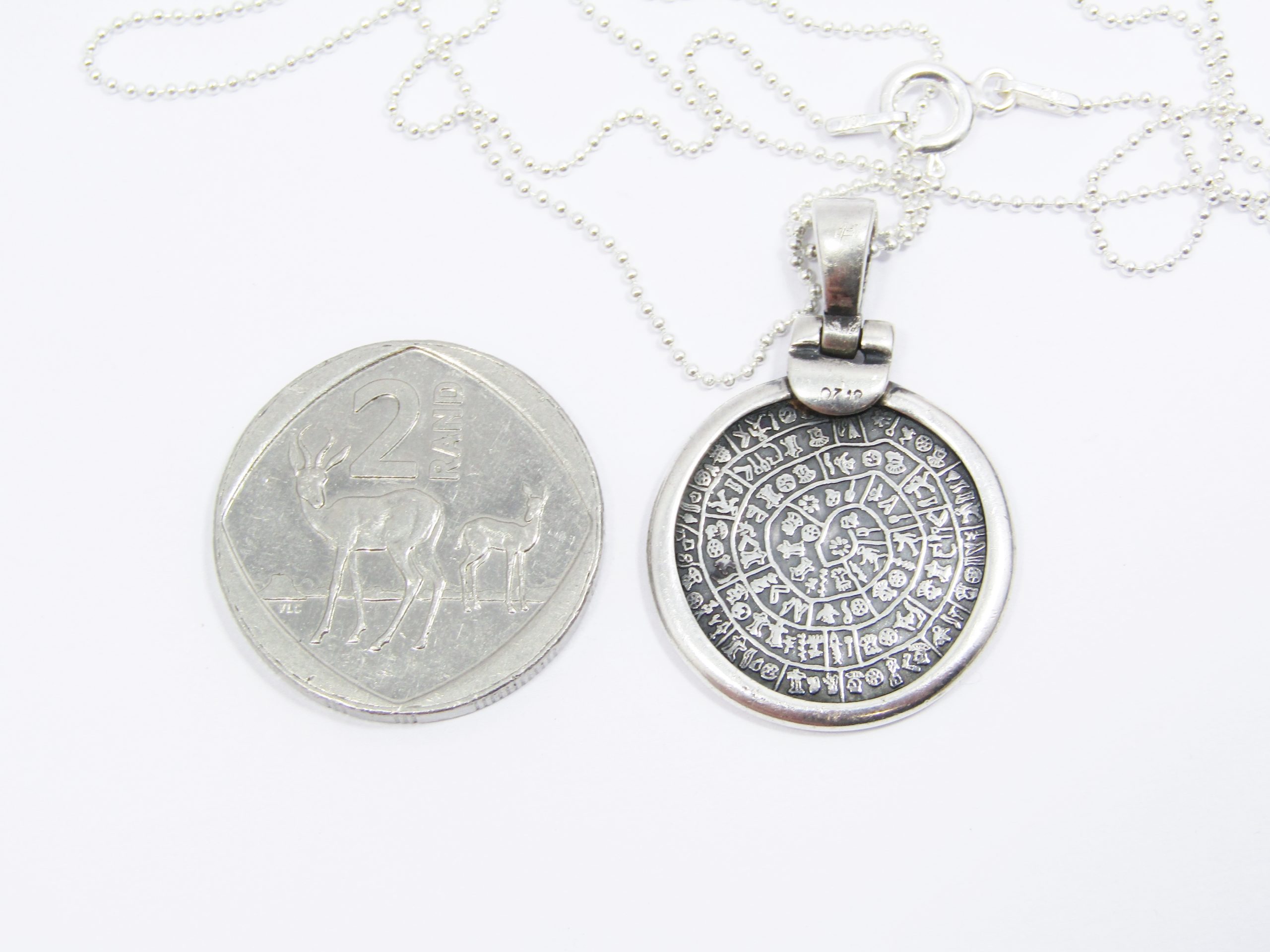 A Gorgeous Aztec Pendant Necklace in Sterling Silver.