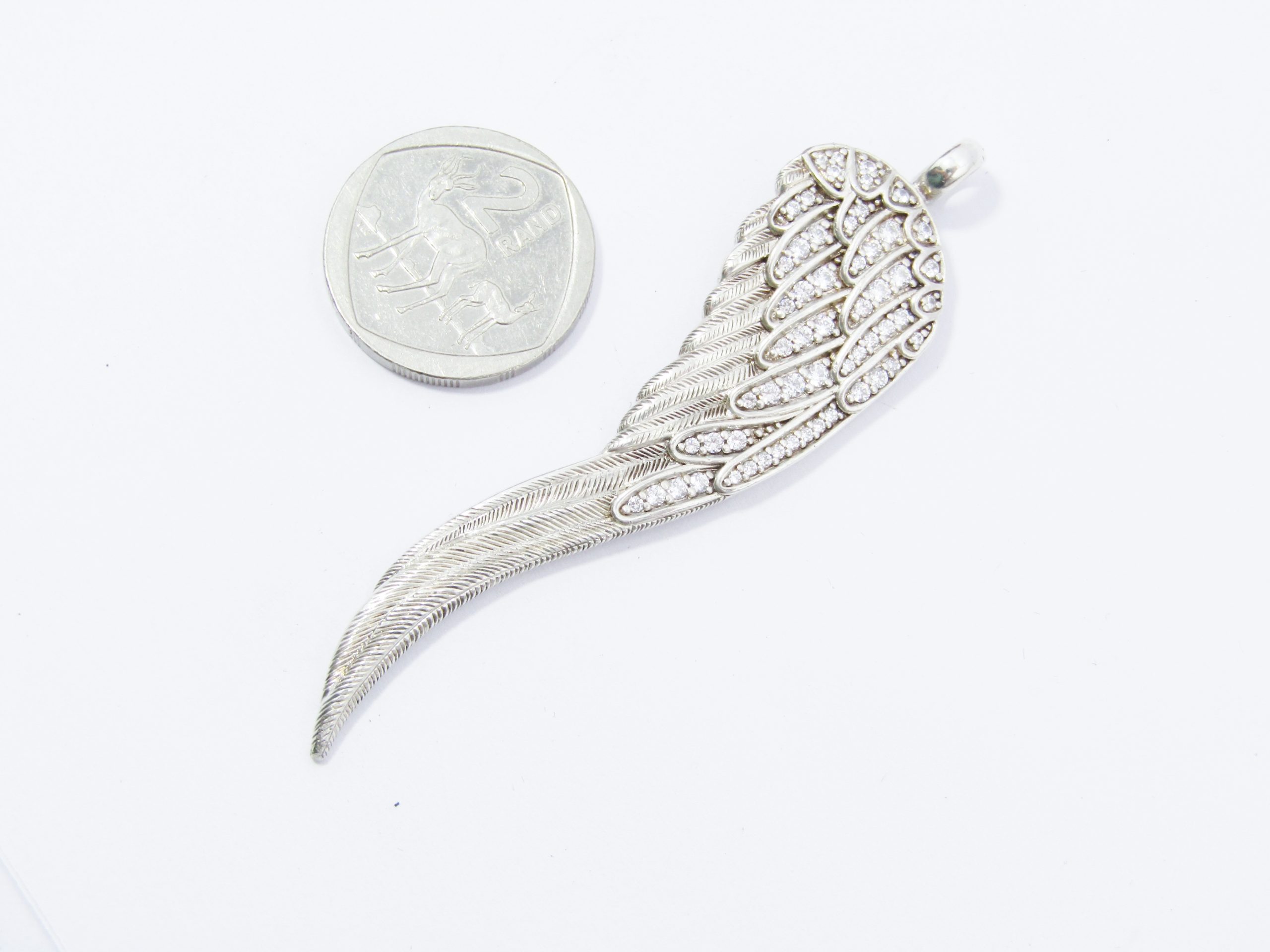A Gorgeous Large Thomas Sabo Zirconia Angel Wing in Sterling Silver.