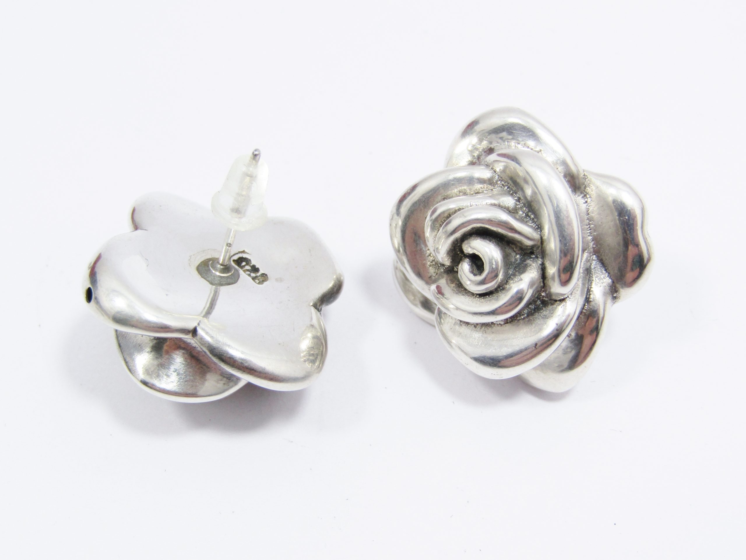 A Gorgeous Pair of Hollow Rose Design Earrings in Sterling Silver.