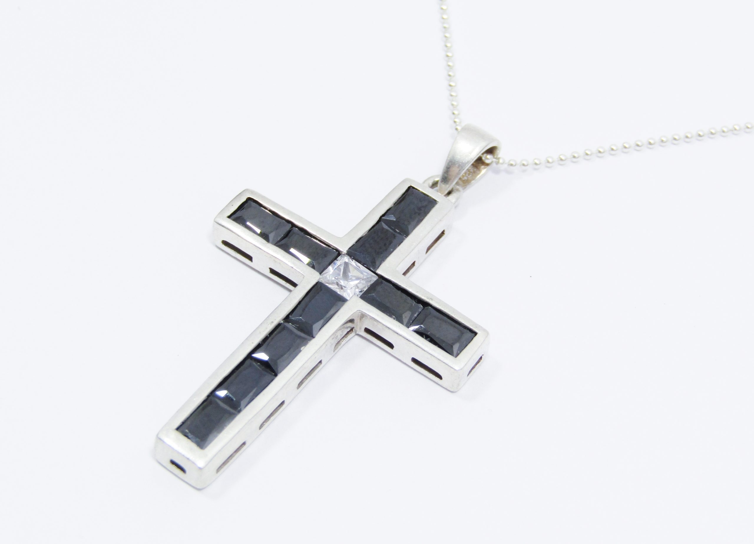 A Lovely Black Stone Zirconia Cross Pendant on Chain in Sterling Silver