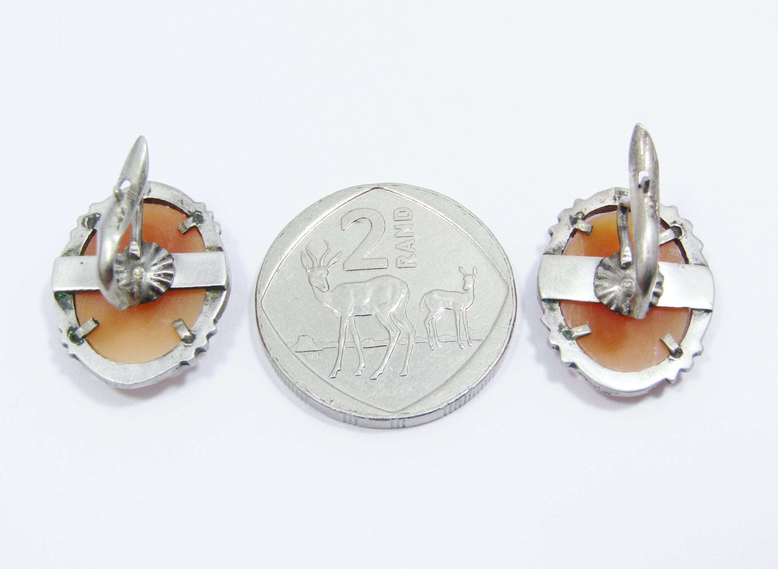 A Gorgeous Pair of Vintage Carved Cameo Screw Back Earrings in Silver.