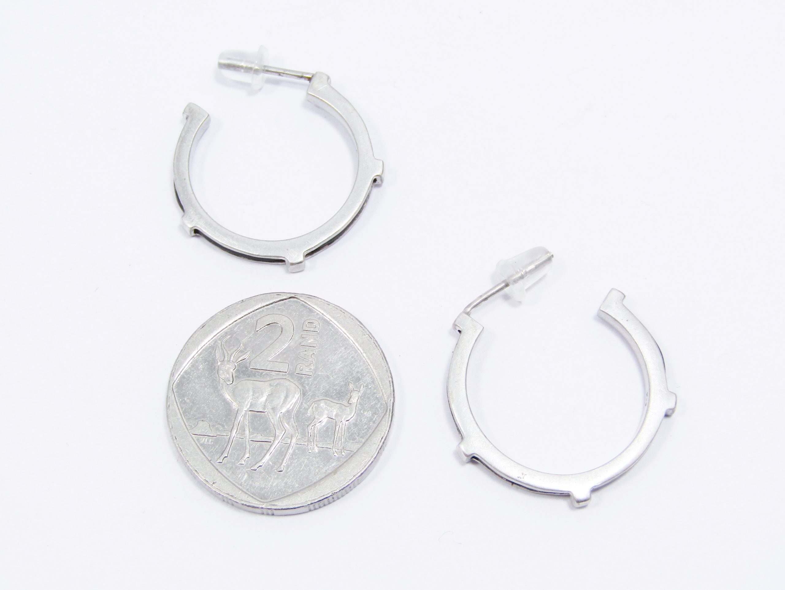 A Lovely Pair of Elephant Hair Hoop Earrings in Sterling Silver.