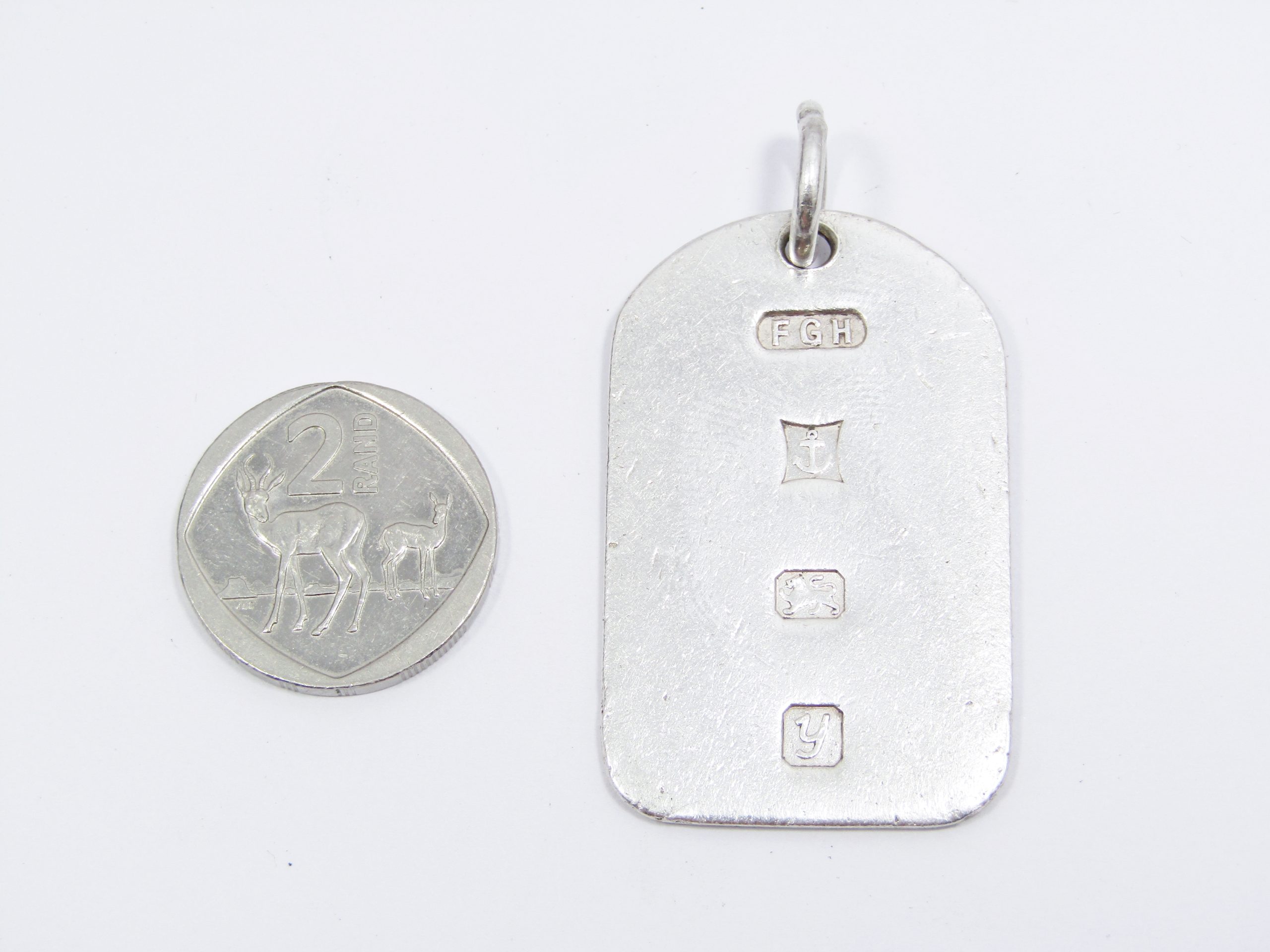 A Lovely Sterling Silver Bullion Pendant with UK Hallmarks